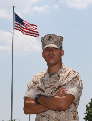 Lance Cpl. Guilherme Oliveira, originally from Minas Gerais, Brazil, and now a resident Pompano Beach, Fla., serves as a supply clerk with Headquarters and Service Company, 8th Engineer Support Battalion, 2nd Marine Logistics Group.  Oliveira received his citizenship during a naturalization ceremony July 4, 2010, aboard Camp Lejeune, N.C., two and a half years after immigrating to the United States. (U.S. Marine Corps photo by Lance Cpl. Bruno J. Bego)