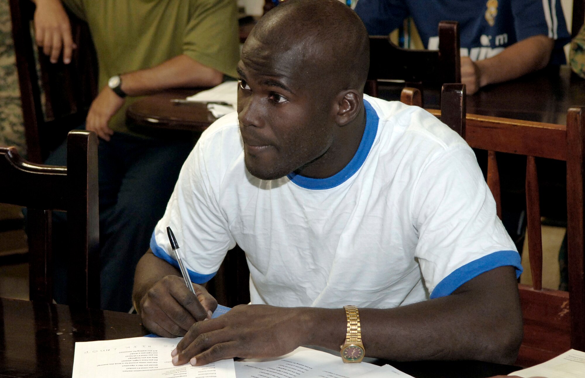 A member of the Panamanian Frontier Police takes notes during an English class July 3, 2010, at the 1st Brigade Headquarters in Meteti, site of New Horizons Panama 2010, a U.S. Southern Command sponsored humanitarian mission designed to provide medical care and quality-of-life improvement projects for the people of Panama. (U.S. Air Force photo/Tech. Sgt. Eric Petosky)
