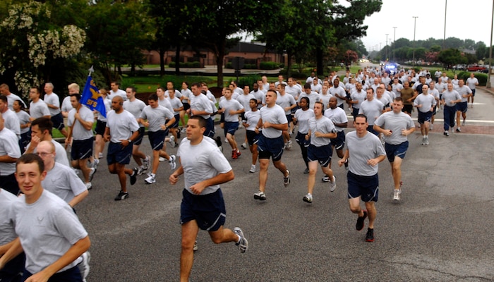 Airmen dash off as the horn sounds at the beginning of the Commander's Fitness Challenge on Joint Base Charleston, S.C., July 1, 2010. This month's fitness challenge consisted of a two-and-a-half mile run as well as a one-mile family and pet fun run. (U.S. Air Force photo/Senior Airman Timothy Taylor)
