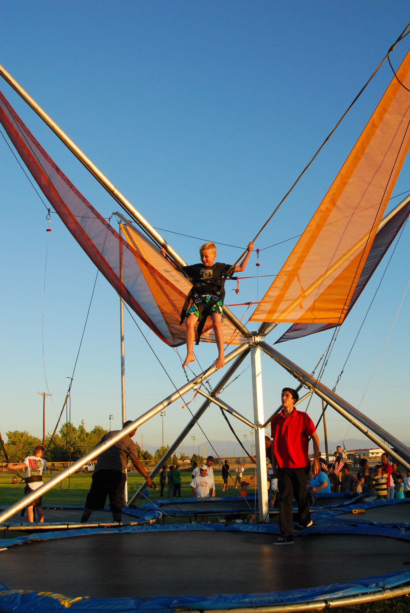 Seth spent his seventh birthday at Summer Bash enjoying the entertainment, but especially liked the Euro Bungee.  (Air Force photograph by Stephen K. Robinson)