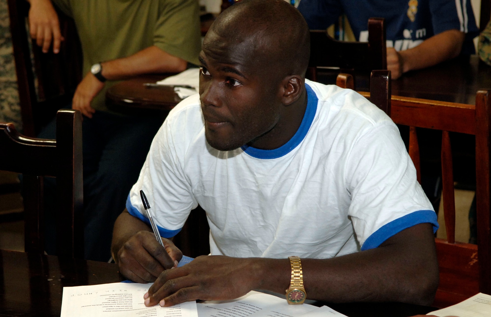 A member of the Panamanian Frontier Police (SENAFRONT) takes notes during an English class at the 1st Brigade Headquarters in Meteti, site of New Horizons Panama 2010, a U.S. Southern Command sponsored humanitarian mission designed to provide medical care and quality-of-life improvement projects for the people of Panama. (U.S. Air Force photo/Tech. Sgt. Eric Petosky)