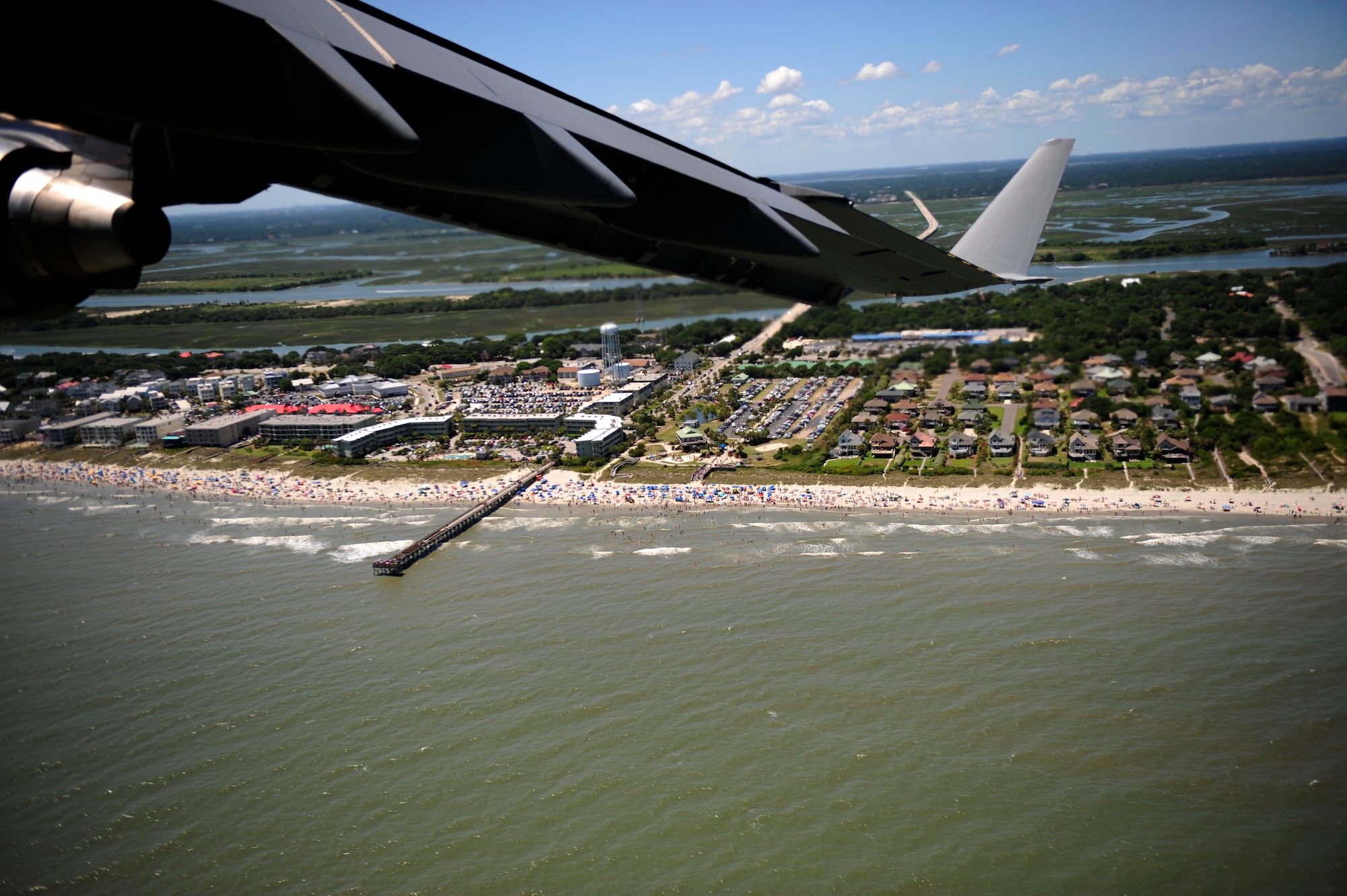 Airmen with the 14th Airlift Squadron, Joint Base Charleston, S.C., fly a Charleston C-17 Globemaster III 500 feet above the shoreline from Myrtle Beach, S.C., to to Hilton Head Island, S.C., during the Salute from the Shore Flyover July 4, 2010. The C-17 flew 2,000 feet off the shoreline at low levels ranging from 500 to 1,000 feet. (U.S. Air Force photo/Staff Sgt. DeNoris Mickle)