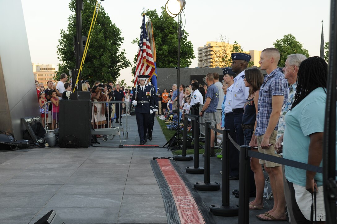 The U.S. Air Force Honor Guard colors team prepares to post the colors for the opening ceremony at the Independence Day concert performed by the United States Air Force Concert Band July 4 at the Air Force Memorial. The Concert Band and Singing Sergeants performed at the memorial in celebration of Independence Day. The event culminated in a view of the National fireworks from across the Potomac River For more information, please visit www.usafband.af.mil. (U. S. Air Force photo by Senior Airman Jaclyn McDonald) 