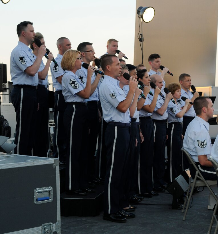 The United States Air Force Band's choir ensemble, Singing Sergeants, performed at the Air Force Memorial July 4. The Concert Band and Singing Sergeants performed at the memorial in celebration of Independence Day. The event culminated in a view of the national fireworks from across the Potomac River. For more information, please visit www.usafband.af.mil. (U. S. Air Force photo by Senior Airman Jaclyn McDonald)
