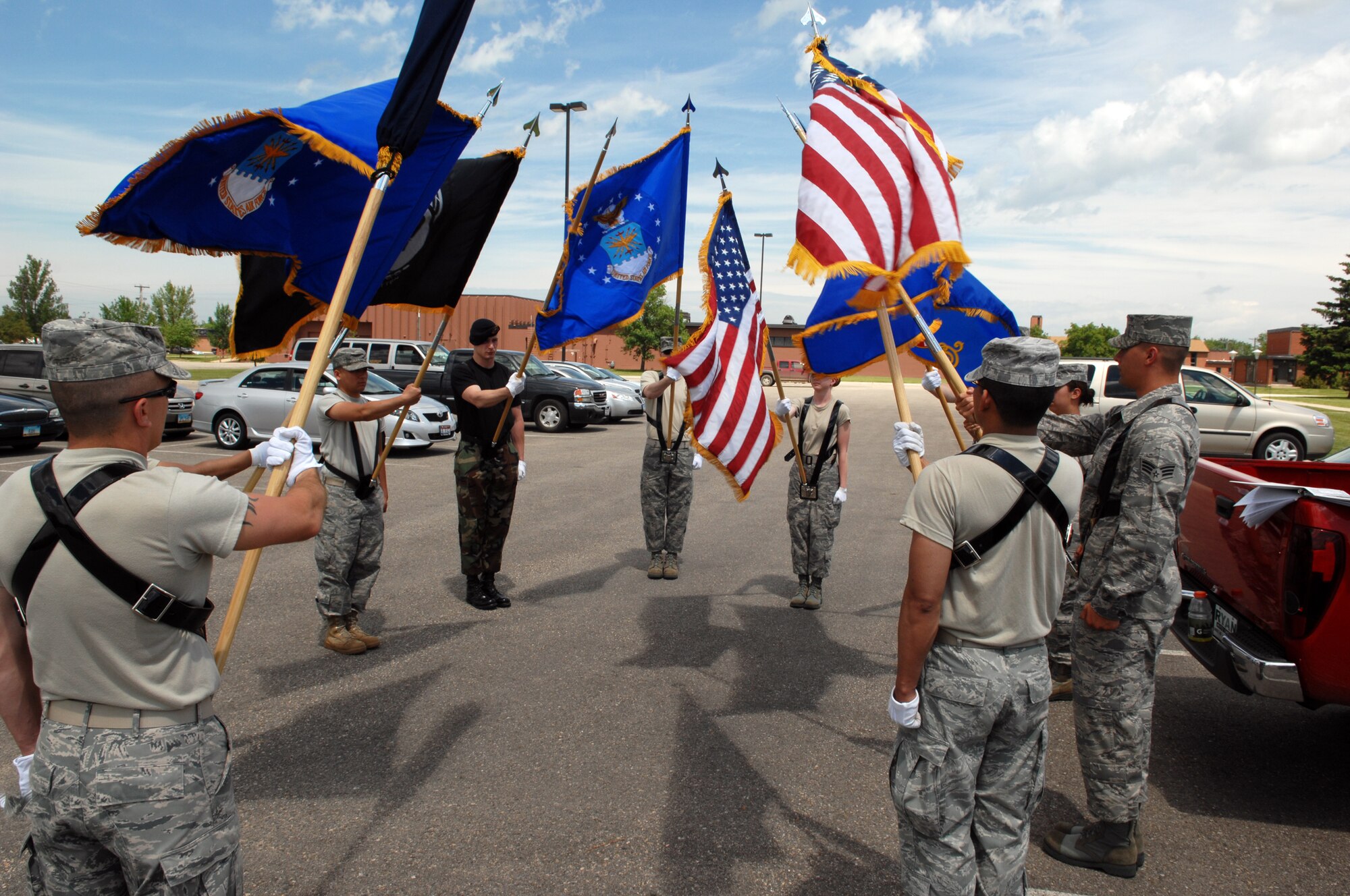 MINOT AIR FORCE BASE, N.D. -- Members of various base honor guards, practice proper procedures for a full-honors funeral here June 24. The U.S. Air Force Honor Guard’s Mobile Training Team traveled to Minot AFB to educate and train Airmen on basic protocol, honors and ceremonies, as well as create certified trainers for their units. (U.S. Air Force photo by Senior Airman Michael J. Veloz)
