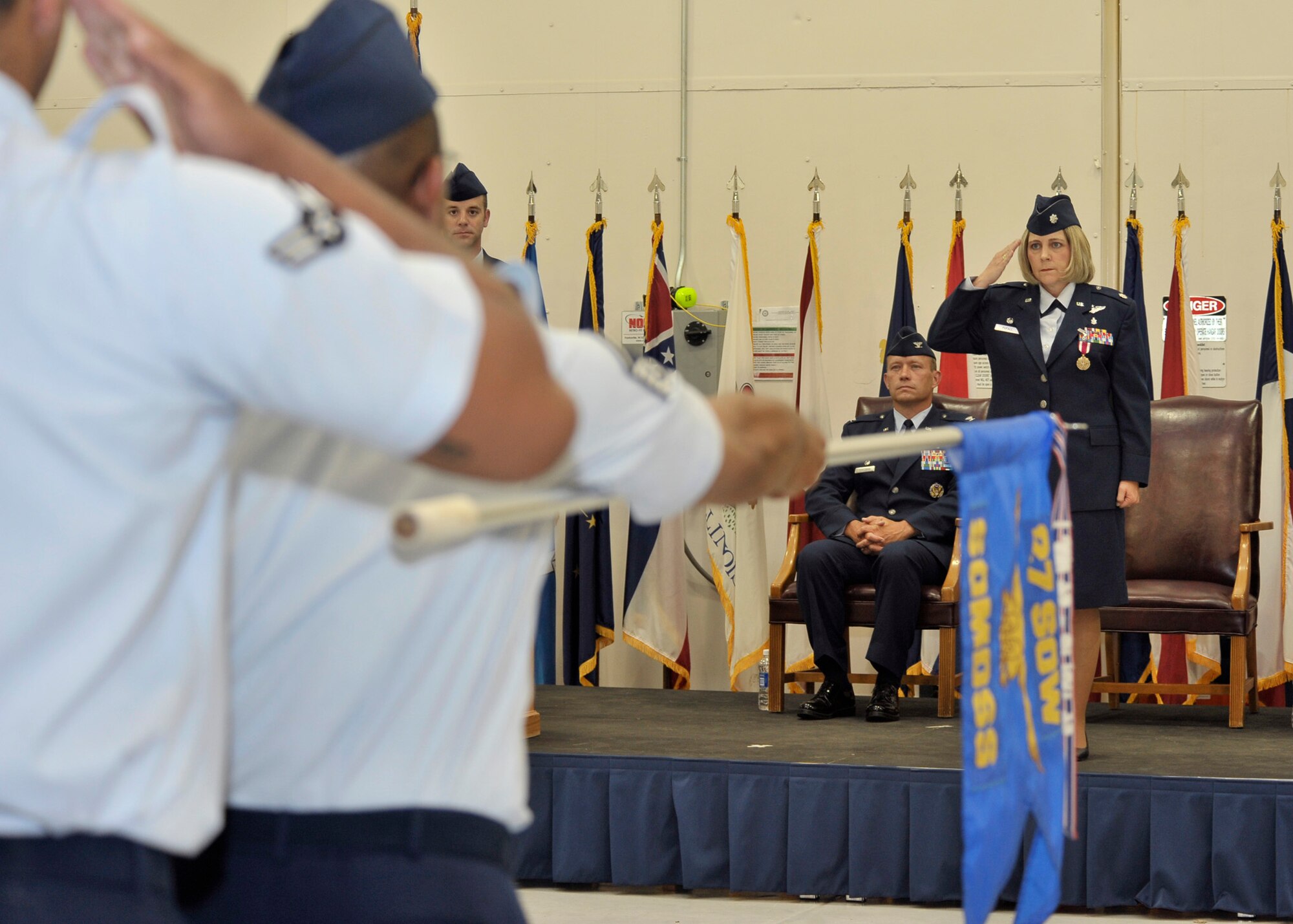 Members of the 27th Special Operations Medical Support Squadron renders their final salute to U.S. Air Force Lt. Col. Michelle Pufall at Cannon Air Force Base, N.M., July 6, 2010. The final salute is given by the squadron and signifies the end of the commander's tenure. (U.S. Air Force photo by Staff Sgt. Heather R. Redman) (RELEASED)
