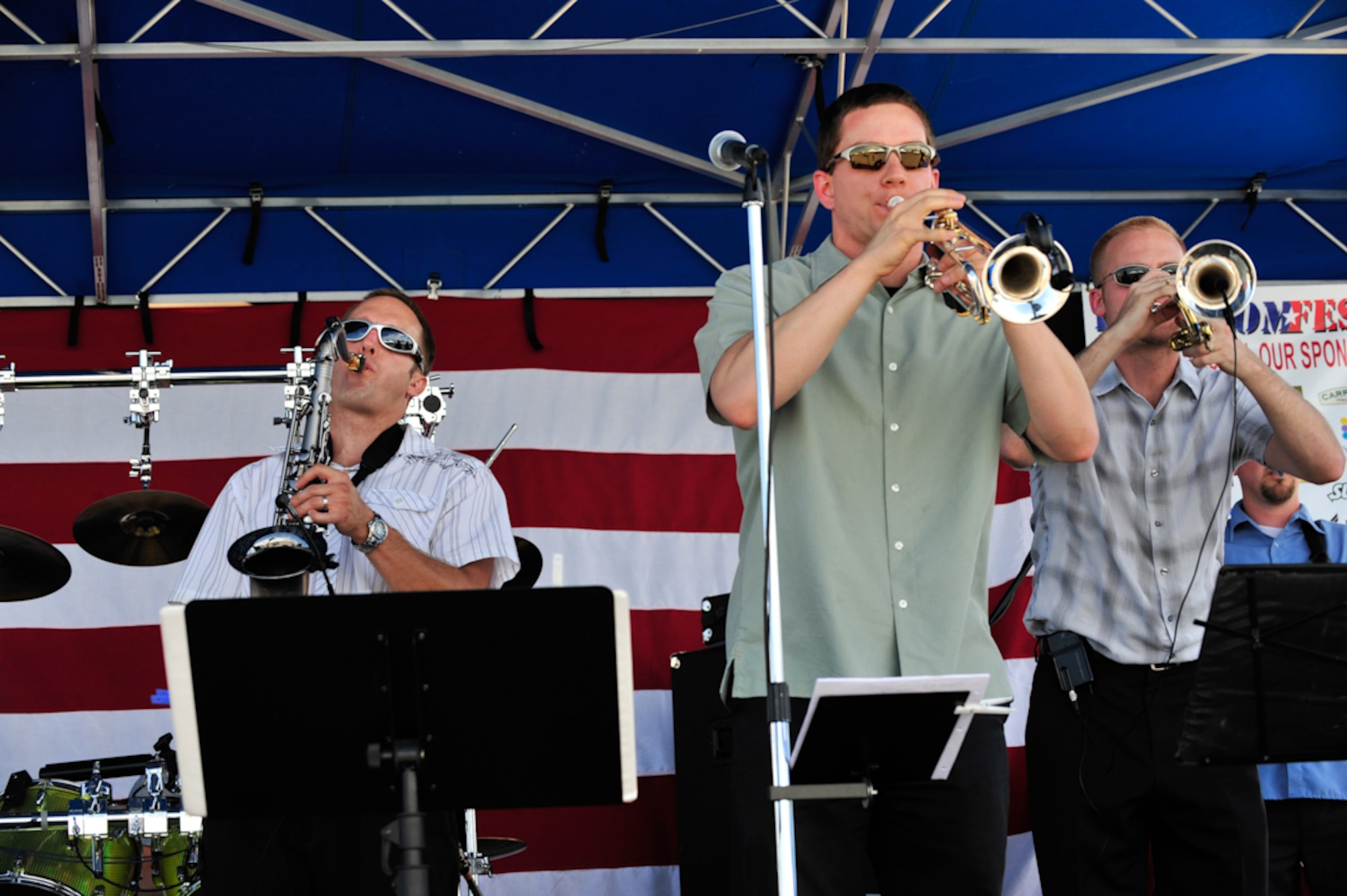 BUCKLEY AIR FORCE BASE, Colo. -- The brass section of Homeslice, a Colorado vocal and horn ensemble, performs for Buckley's 2010 Freedom Fest July 1. The band played music ranging from classic rock to country to Michael Jackson. (U.S. Air Force photo by Staff Sgt. Kathrine McDowell)