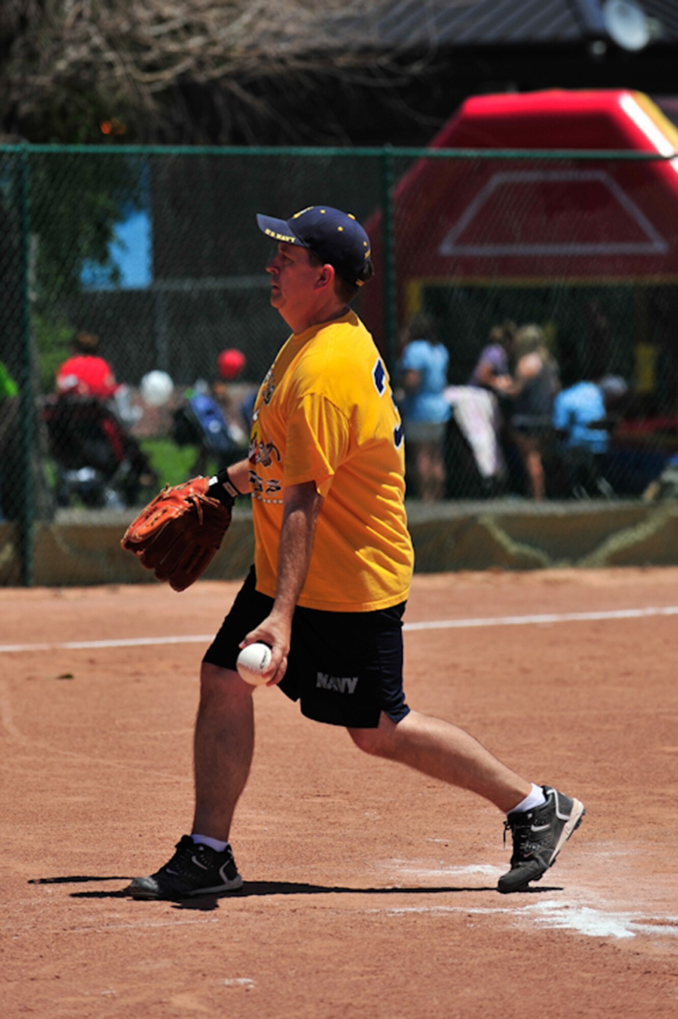 BUCKLEY AIR FORCE BASE, Colo. --  Chief Petty Officer Kevin Wilson, Naval Information Operations Command Colorado, takes the pitcher's mound during the Chiefs vs Eagles softball game July 1. The enlisted leadership lost to the base commanders 12-11 during their yearly game. (U.S. Air Force photo by Staff Sgt. Kathrine McDowell)