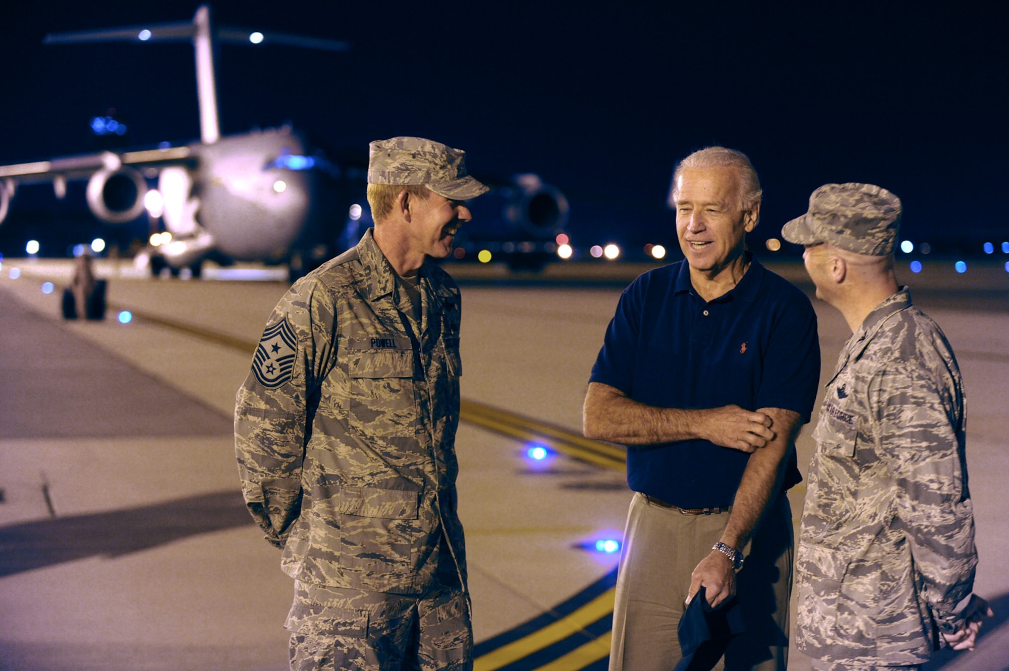 RAF MILDENHALL, England -- Vice President of the United States Joe Biden talks with Chief Master Sgt. Christopher Powell, 100th Air Refueling Wing command chief (left) and Col. Chad Manske, 100th ARW commander, on the RAF Mildenhall flightline in the early hours of July 5. The vice president?s late-night visit came after spending Independence Day with deployed servicemembers at Camp Victory, Iraq. (U.S. Air Force photo/Staff Sgt. Jerry Fleshman)