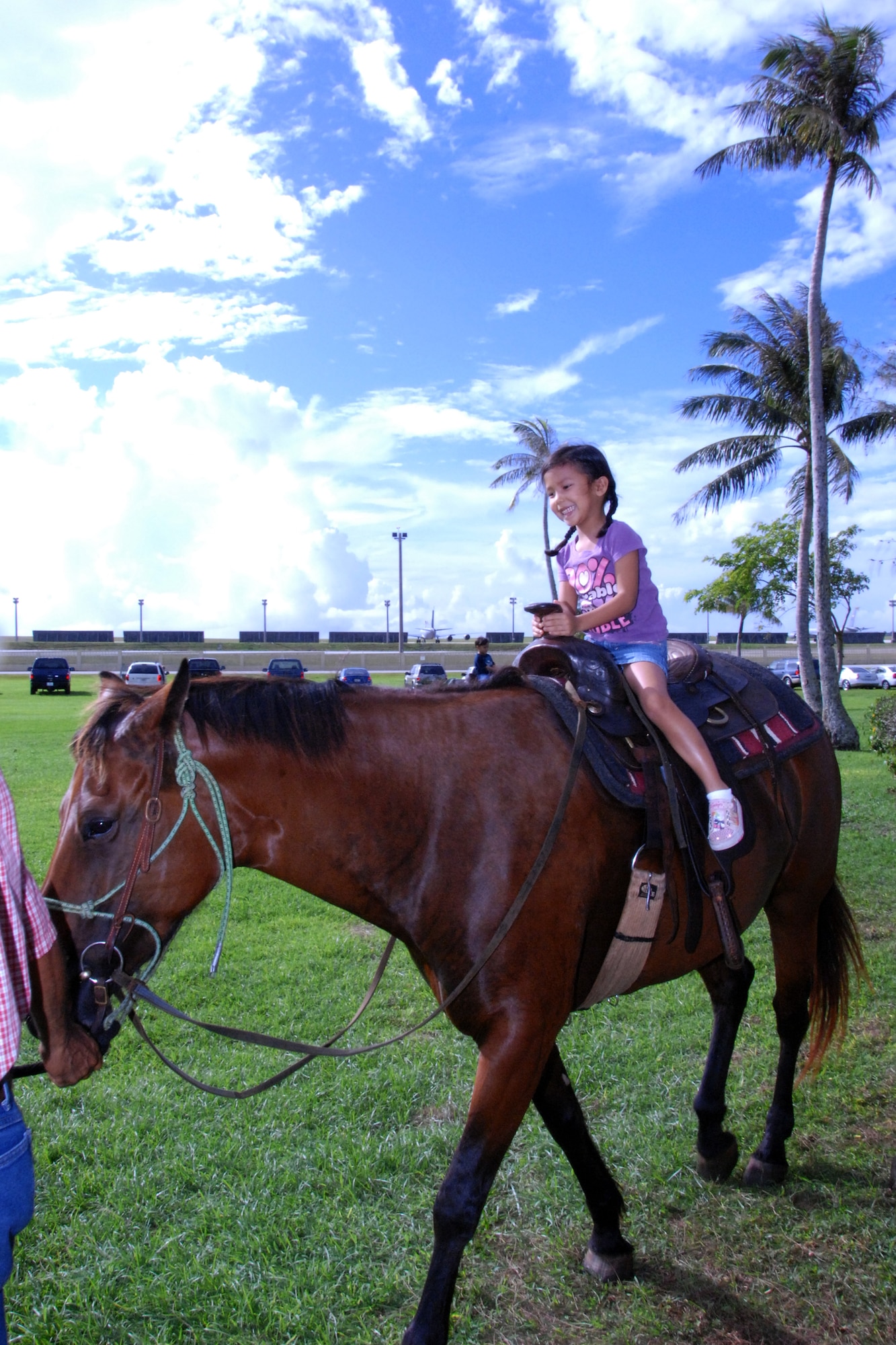 ANDERSEN AIR FORCE BASE, Guam - Servicemembers and their families came out to celebrate Independence Day at Arc Light Memorial Park July 2. The annual Freedom Fest featured games, bouncy castles and horseback riding. (U.S. Air Force photo by Airman Whitney Amstutz)