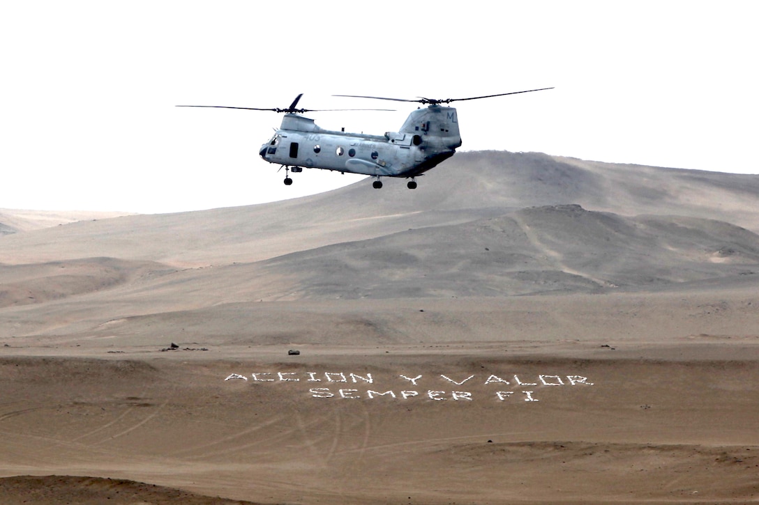 A U.S. Marine Corps CH-46, based out of Edwards Air Force Base, Calif. transports Marines from the Special Purpose Marine Air-Ground Task Force 24 to a beach in Ancon, Peru on July 7, 2010. The unit is embarked on the transport dock ship USS New Orleans (LPD 18)  in support of operation Partnership of the Americas/Southern Exchange, a combined amphibious exercise designed to enhance cooperative partnerships with maritime forces from Argentina, Mexico, Peru, Brazil, Uruguay, and Colombia.   (U.S. Marine Photo photo by Cpl Brian J. Slaght/Released)