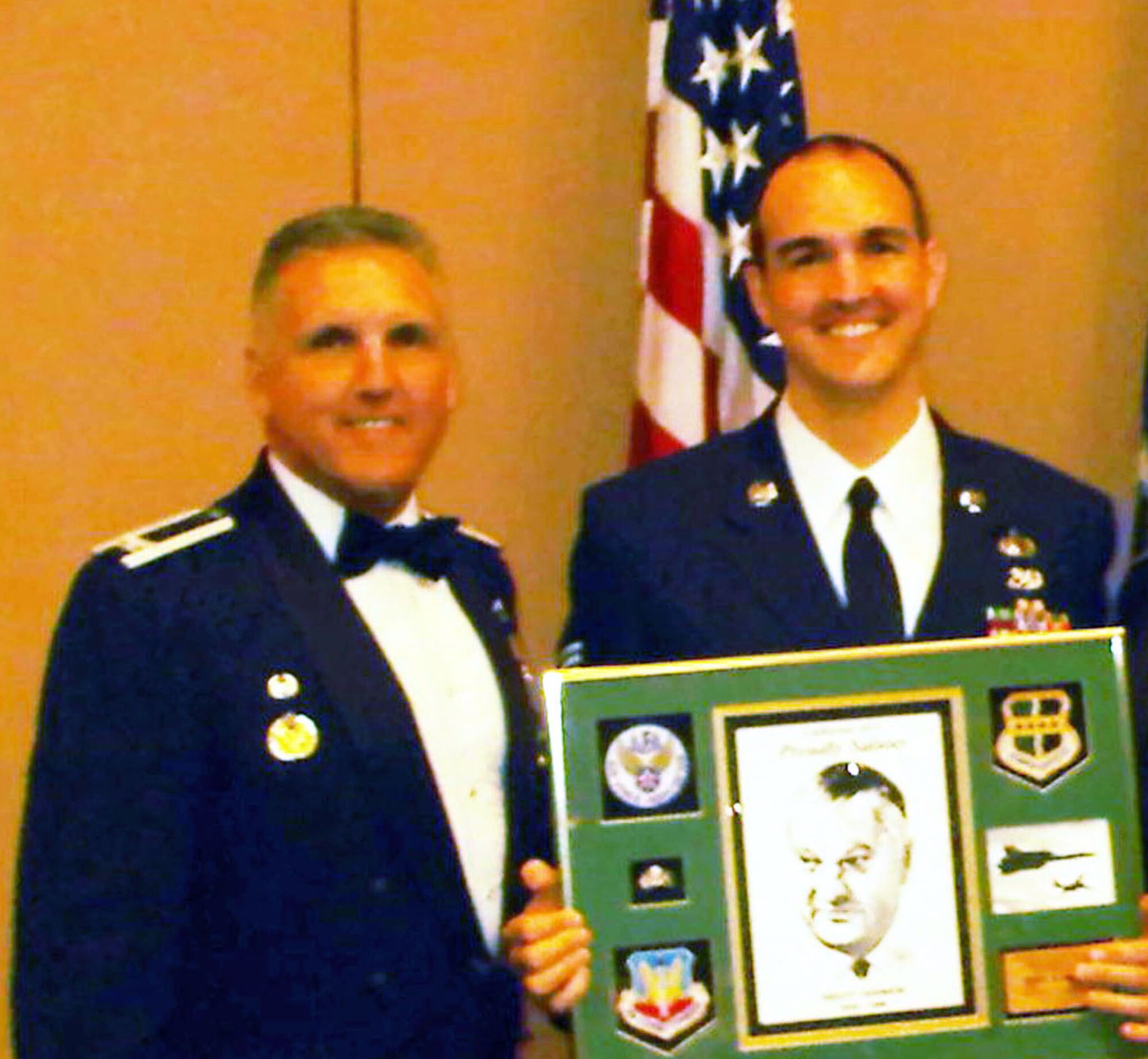 TRAVIS AIR FORCE BASE, Calif. - Col. Jay Flournoy, 349th Air Mobility Wing commander congradulates the California Air Force Association award winners for 2010. (U.S. Air Force courtesy photo)                         