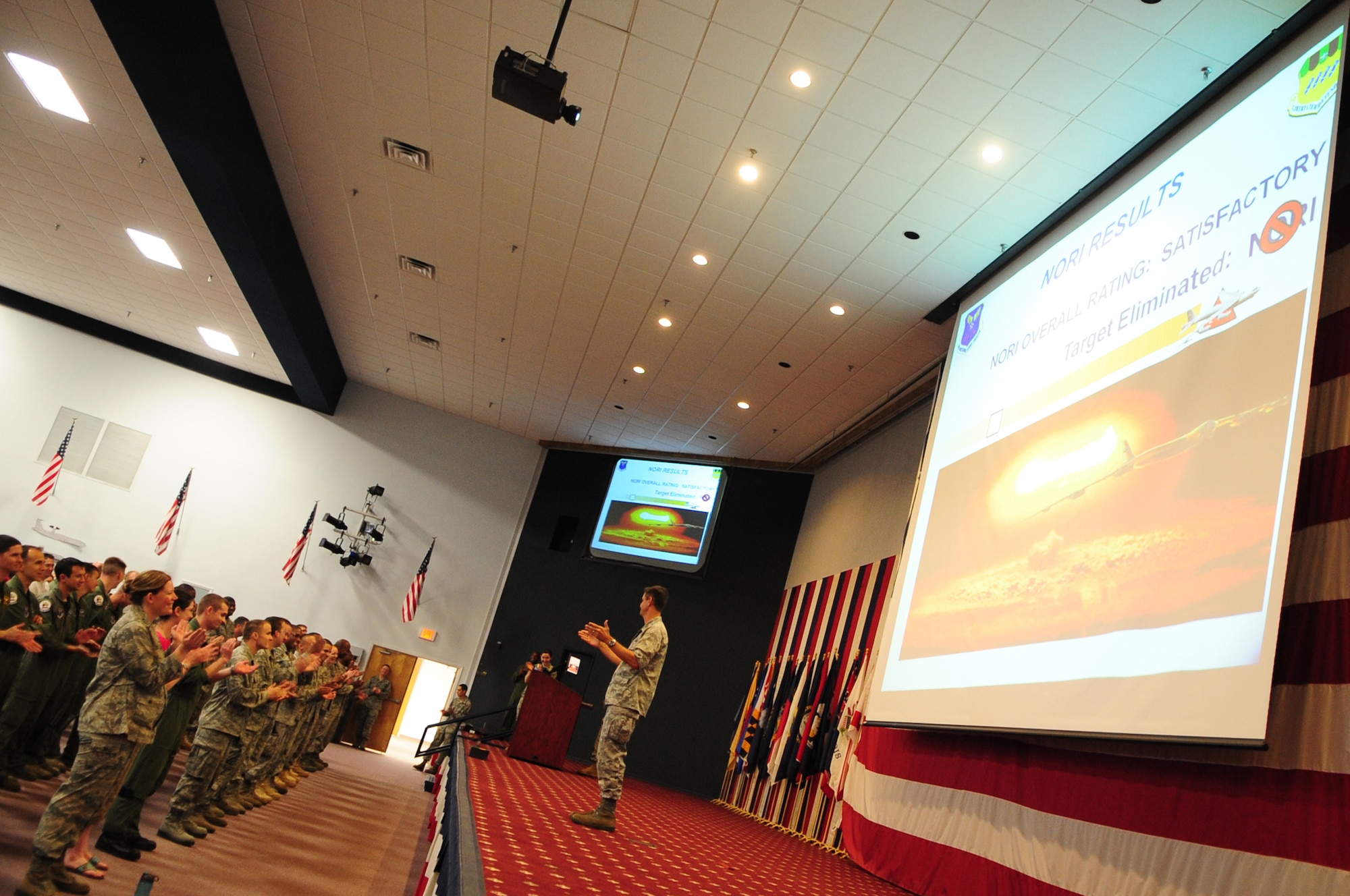 BARKSDALE AIR FORCE BASE, La. – Col. Steven Basham, 2d Bomb Wing commander, congratulates the wing on completing a Nuclear Operational Readiness Inspection during a post-NORI celebration held at Hoban Hall July 1. After numerous exercises to prepare for the NORI, the wing scored a ‘satisfactory’ rating for the inspection. (U.S. Air Force photo by Senior Airman Joanna M. Kresge)