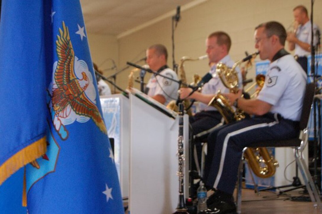 The saxophone section of Dimensions in Blue entertains the crowd during a Dimensions in Blue performance in Fredericksburg, TX on July 4, 2010.
