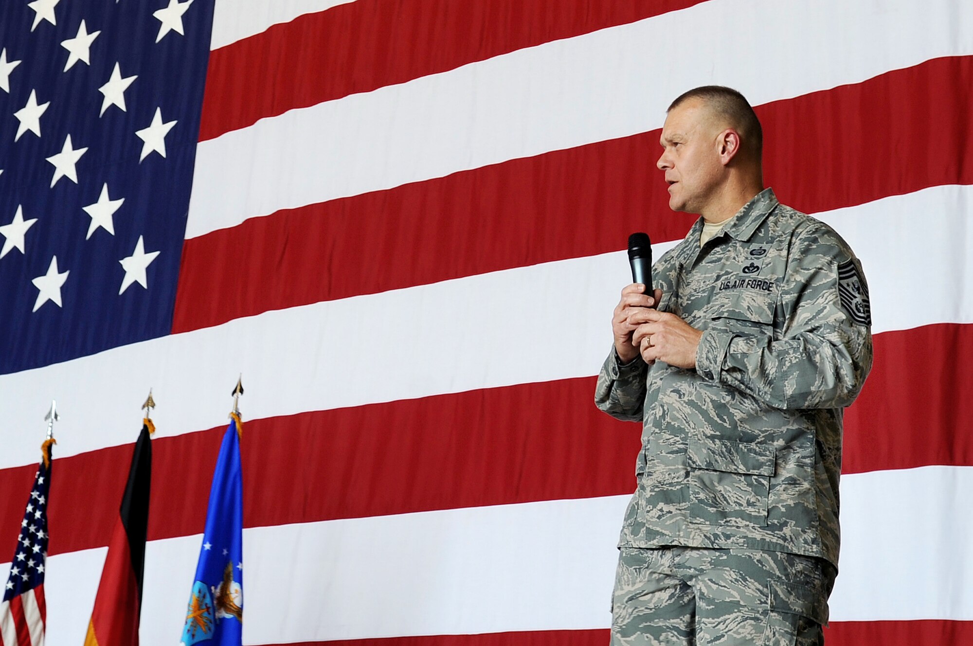 Chief Master Sgt. of the Air Force James A. Roy speaks to Airmen during an enlisted call July 7, 2010 at Ramstein Air Base, Germany. Chief Roy and his wife, Paula, visited several the 603rd Air Operations Center, 435th Contingency Response Group and Landstuhl Regional Medical Center. (U.S. Air Force photo/Airman 1st Class Grovert Fuentes-Contreras)