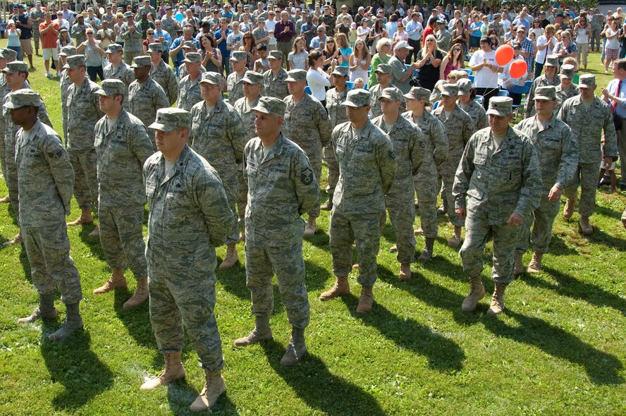 HANSCOM AIR FORCE BASE, Mass. – Airmen gather in front of the stage as supporters surround them during the Heroes Homecoming event on June 25. Thirty-eight Airmen who have recently returned from deployments and their families were honored during the ceremony at Memorial Park. (U.S. Air Force photo by Rick Berry)