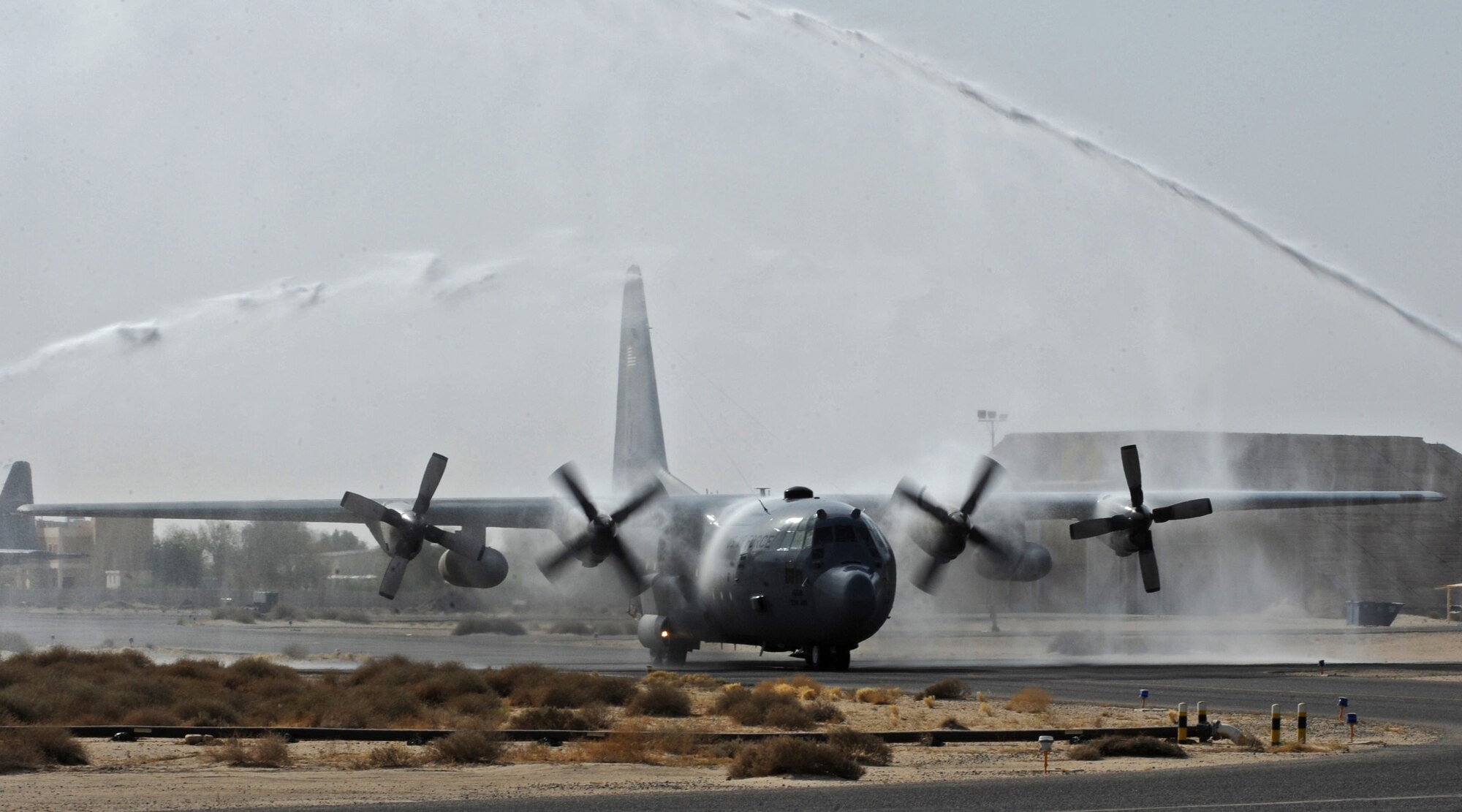 SOUTHWEST ASIA - Col. Mark Czelusta, outgoing 386th Expeditionary Operations Group commander, taxis the runway in a C-130 H1 during his final flight here July 4, 2010. Colonel Czelusta said farewell as Col. Scott Brewer assumed command of the 386th EOG. (U.S. Air Force photo by Senior Airman Laura Turner)