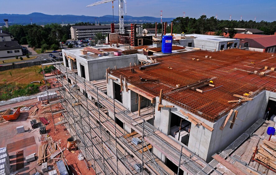 Construction continues on the new dormitory complex at the corner of Mitchell and Harmon Avenue, Ramstein Air Base, Germany, July 7, 2010. 2010. The new facility will have 128 rooms and is scheduled to be completed by April 2011. (U.S. Air Force photo by Airman 1st Class Brea Miller)