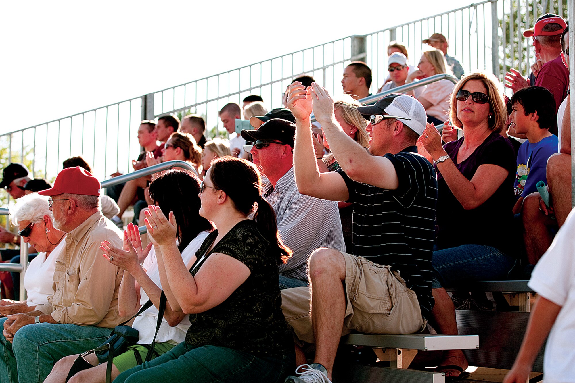 Military members cheer on the Grizzlies during the game at Pioneer Park on June 24.  (U.S. Air Force photo by Jeff Allred)