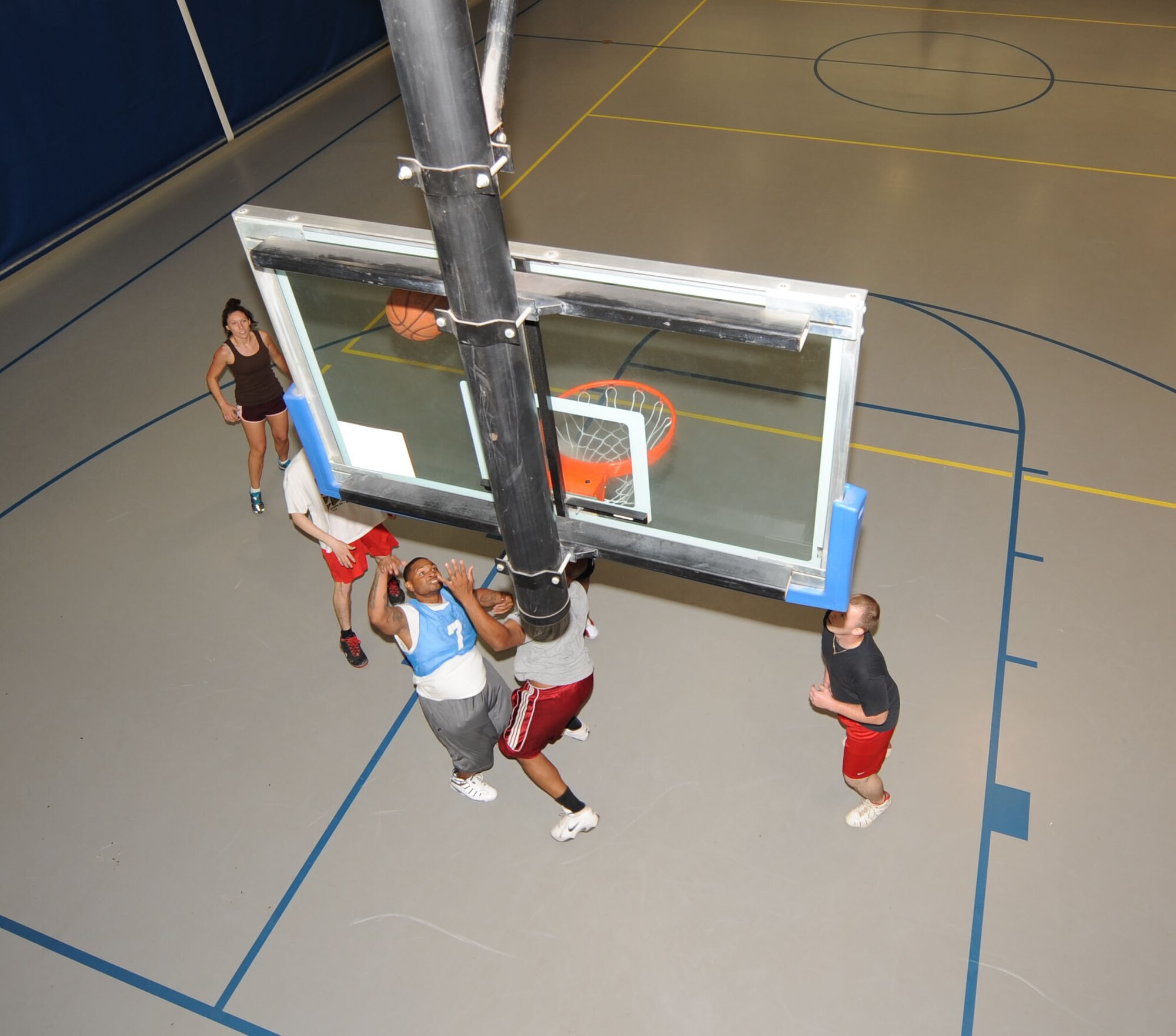 BARKSDALE AIR FORCE BASE, La. – Members of the 2d Civil Engineer Squadron and 2d Communication Squadron compete in a match of 3-on-3 basketball during 2d Bomb Wing Sports Day July 1. The 2d CS won this match. (U.S. Air Force photo by Senior Airman Alexandra M. Boutte) (RELEASED)