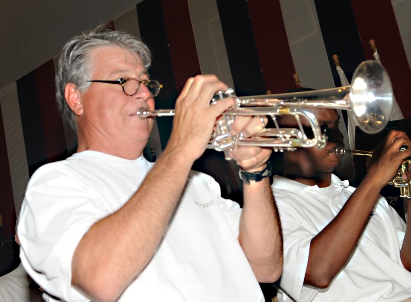 BARKSDALE AIR FORCE BASE, La. – Greg Morrison, Shreveport Metropolitan Concert Band trumpet player, plays “Victory at Sea” during their performance at Hoban Hall July 3.  (U.S. Air Force photo by Senior Airman Alexandra M. Boutte) (RELEASED)