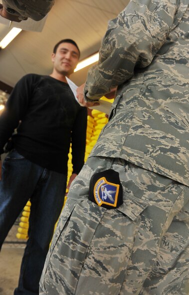 MOODY AIR FORCE BASE, Ga. -- A beret displays the words “Defensor Fortis,” which means defenders of the force, a phrase that applies to the concept of the law enforcement training course by enhancing the knowledge of patrolmen and increasing their ability to protect the base and its Airmen. (U.S. Air Force photo by Airman 1st Class Joshua Green/RELEASED)