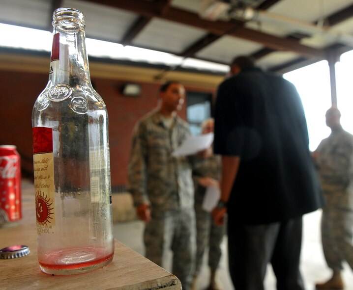 MOODY AIR FORCE BASE, Ga. -- An empty bottle previously containing alcohol sits on the bar table during a law enforcement training course here June 29. During the course, patrolmen were trained on driving under the influence procedures and were able to practice on intoxicated individuals for a more realistic training environment. (U.S. Air Force photo by Airman 1st Class Joshua Green/RELEASED)