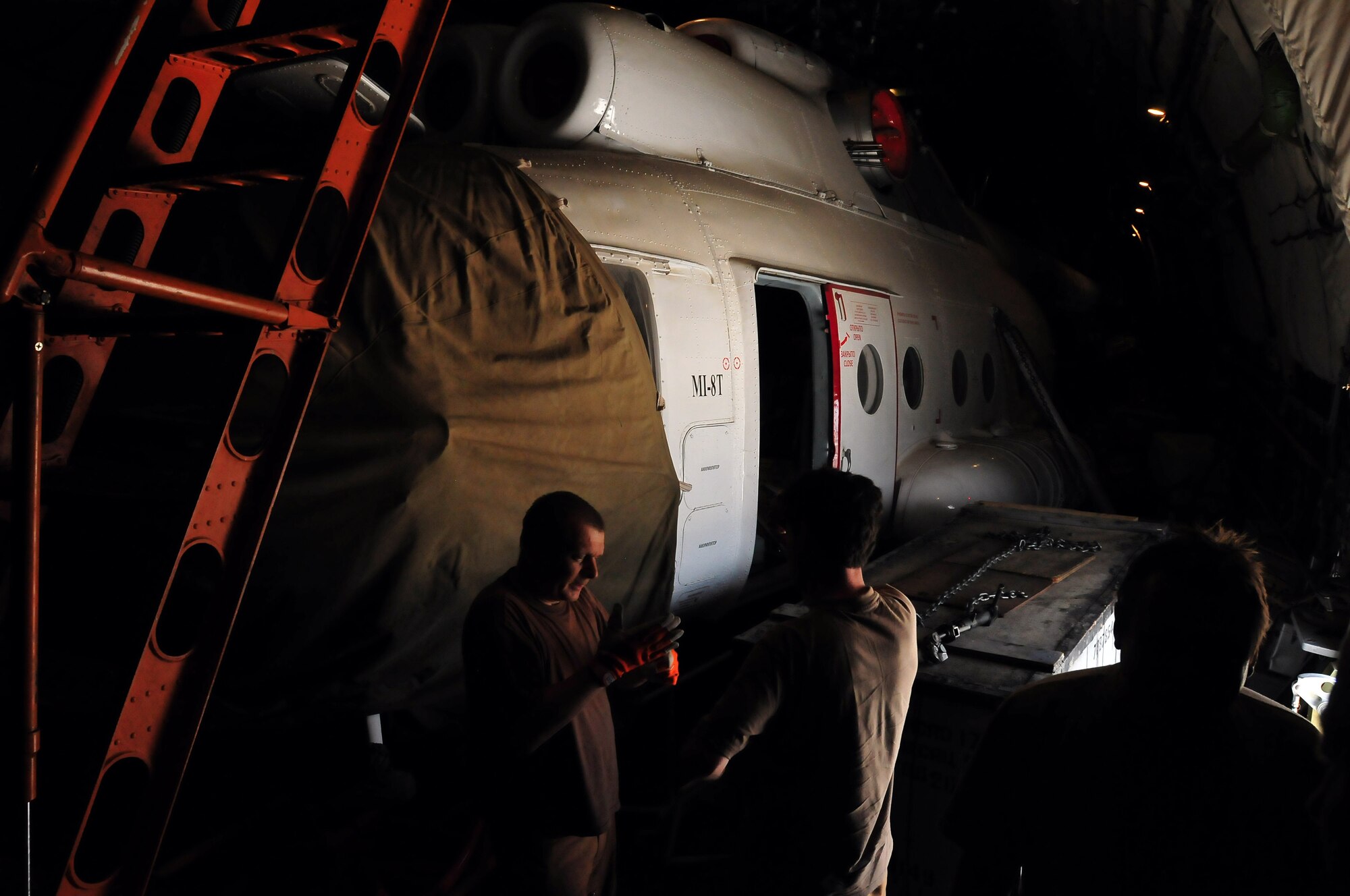 100708-N-6031Q-003 KABUL, Afghanistan -- The Afghan Air Force with help from the Combined Air Power Transition Force, receive two new Mi-17 helicopters on July 8, 2010. The helicopters were delivered by an An-124 strategic airlift jet airplane named by NATO as a "Condor".(US Navy photo by Mass Communication Specialist 2nd Class David Quillen/ RELEASED).