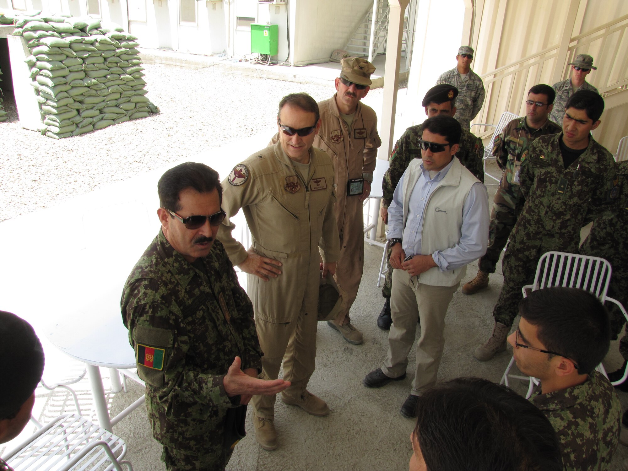 KABUL, Afghanistan – Brig. Gen. Boera, the Commanding General, Combined Air Power Transition Force, NATO Training Mission-Afghanistan/Combined Security Transition Command-Afghanistan, and Commander, 438th Air Expeditionary Wing and Maj. Gen. Darwan, Afghan Air Force commander, tour the Afghan Air Force Thunder Lab, an English immersion program designed to improve the English, aviation and professional skills of Afghan Air Force officers awaiting pilot training on July 8, 2010.  (U.S. Air Force photo by Capt. Rob Leese/RELEASED).