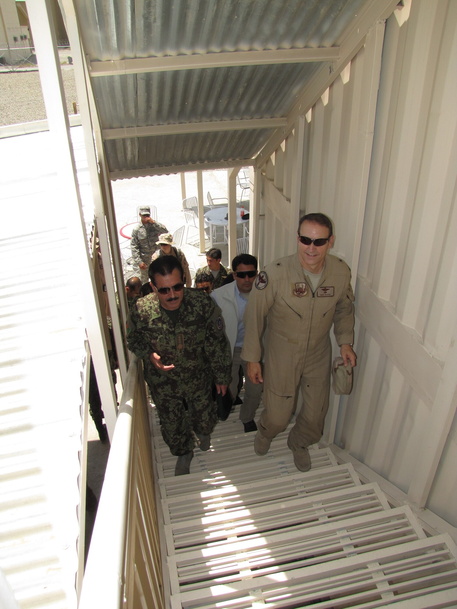 KABUL, Afghanistan – Brig. Gen. Boera, the Commanding General, Combined Air Power Transition Force, NATO Training Mission-Afghanistan/Combined Security Transition Command-Afghanistan, and Commander, 438th Air Expeditionary Wing and Maj. Gen. Darwan, Afghan Air Force commander, tour the Afghan Air Force Thunder Lab, an English immersion program designed to improve the English, aviation and professional skills of Afghan Air Force officers awaiting pilot training on July 8, 2010.  (U.S. Air Force photo by Capt. Rob Leese/RELEASED).