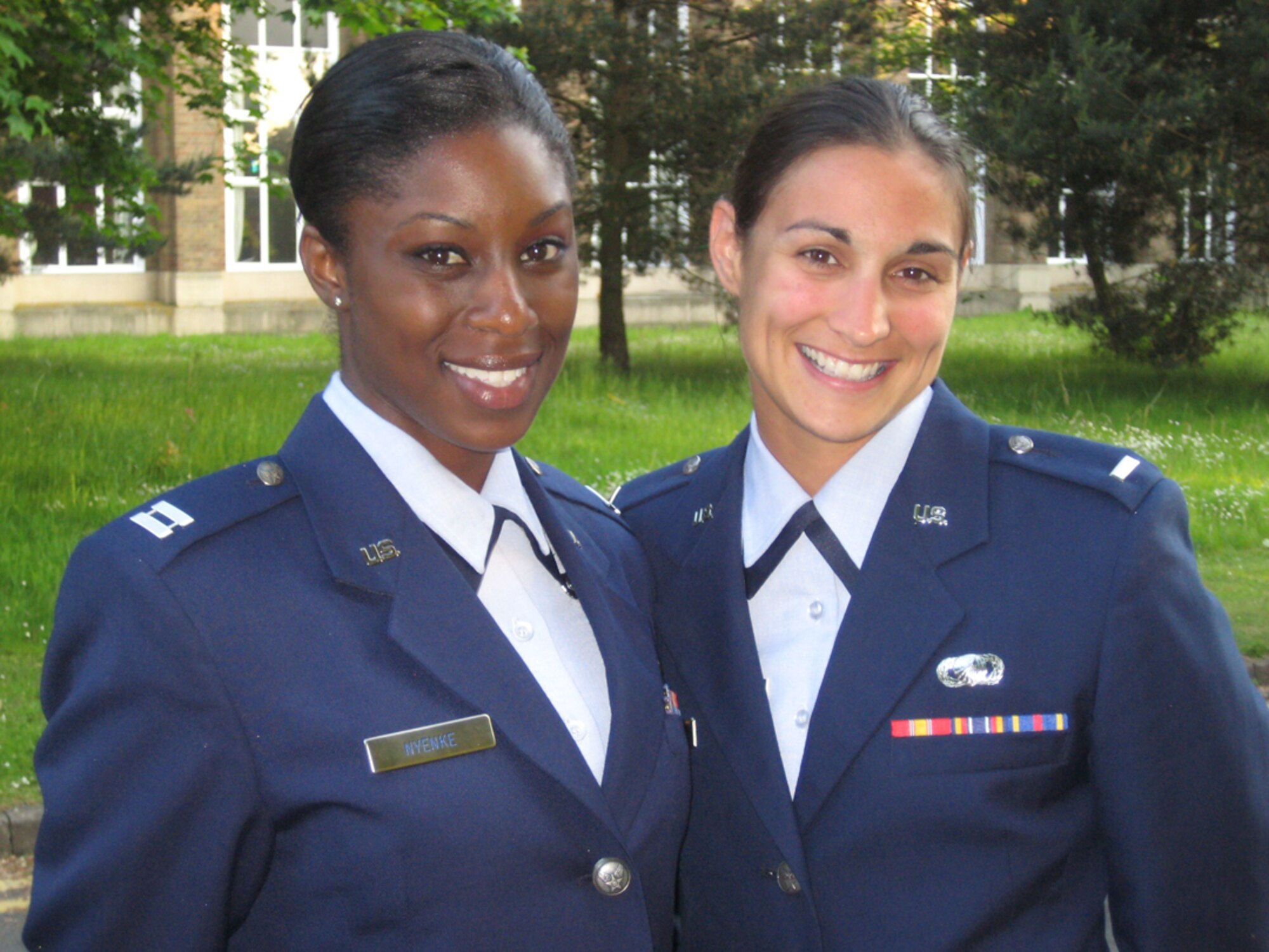 ROYAL AIR FORCE COSFORD, United Kingdom. – Capt. Charlynda Nyenke (left) and 1st Lt. Kathryn Jannazo represent the Air Force at the Allied Command Headquarters Ramstein Track and Field Championships. The two officers competed in women’s four by 100-meter relay in June.  (Courtesy photo)