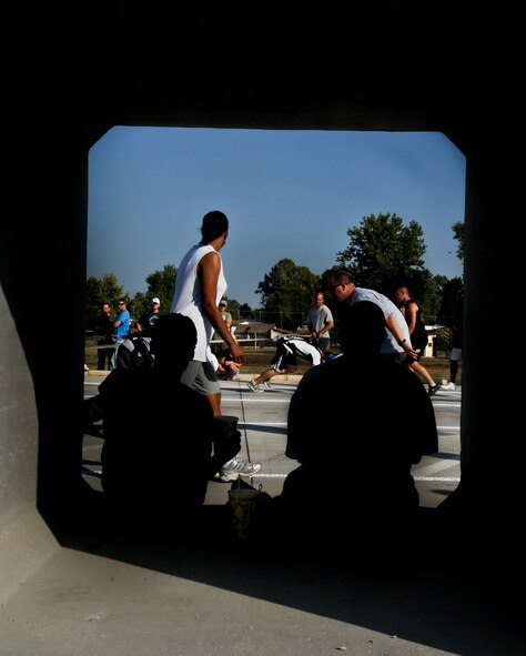 Friends and coaches cheer on participants at the “semi” truck pull during the Strongman Challenge July 4, 2010 at Incirlik Air Base, Turkey. This year Incirlik introduced its first Strongman Challenge with three weight classes and five events. (U.S. Air Force photo/Senior Airman Alexandre Montes)