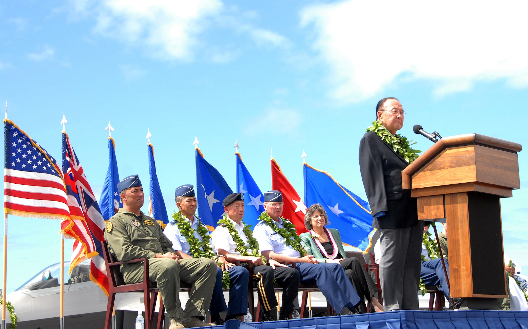 U.S. Senator Daniel K. Inouye speaks at the F-22 Arrival Ceremony July 9, on Joint Base Pearl Harbor-Hickam, Hawaii. Senator Inouye was on hand to help usher in a new era between the Hawaii Air National Guard and Active Duty Air Force. The arrival of the F-22 Raptor marks the beginning of a new associate unit between the 154th Wing, Hawaii Air National Guard, and the 15th Wing, active duty Air Force. This is the first time an F-22 Raptor associate unit will be led by the Guard. (U.S. Air Force photo/Tech. Sgt. Betty J. Squatrito-Martin)
