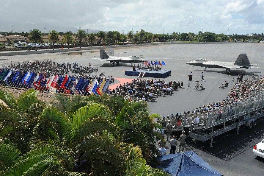 The F-22 Arrival Ceremony is held here, July 9. The F-22 Raptor is the Air Force's newest fighter aircraft. Its combination of stealth, supercruise, maneuverability, and integrated avionics, coupled with improved supportability, represents an exponential leap in warfighting capabilities. The ceremony marks the beginning of the partnership between the Hawaii Air National Guard and the active duty Air Force flying the “fifth generation” fighter at Hickam. The F-22 Raptors are assigned to the 199th Fighter Squadron, 154th Wing, Hawaii Air National Guard and the 19th Fighter Squadron, 15th Wing. (U.S. Air Force photo/Senior Airman Gustavo Gonzalez)