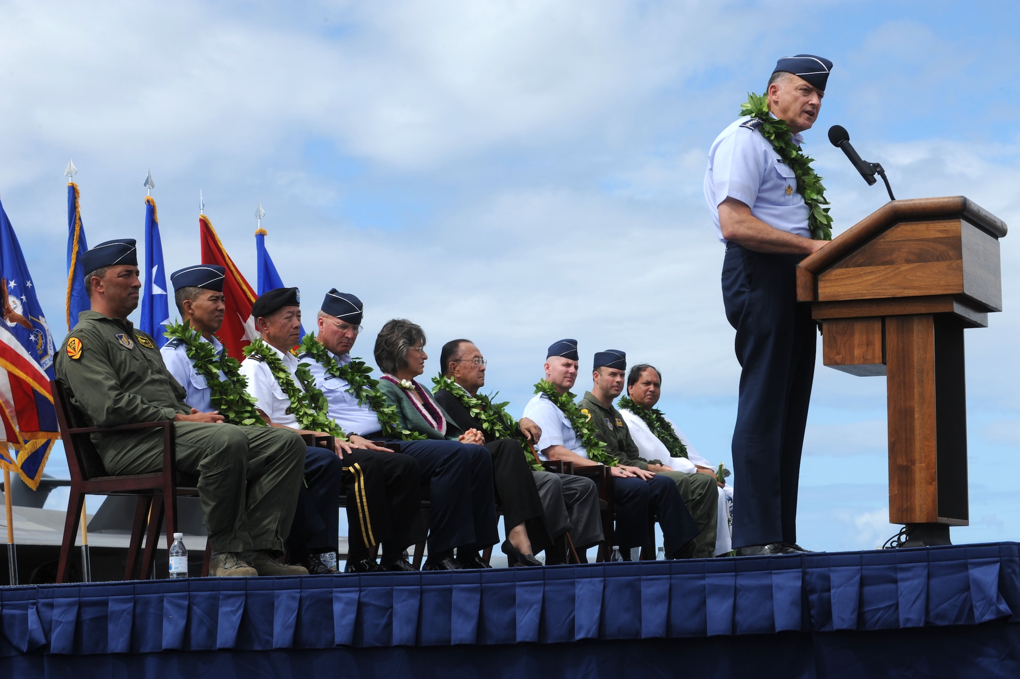 Gen. Gary L. North is Commander, Pacific Air Forces, speaks during the F-22 Arrival Ceremony here, July 9. The F-22 Raptor is the Air Force's newest fighter aircraft. Its combination of stealth, supercruise, maneuverability, and integrated avionics, coupled with improved supportability, represents an exponential leap in warfighting capabilities. The ceremony marks the beginning of the partnership between the Hawaii Air National Guard and the active duty Air Force flying the “fifth generation” fighter at Hickam. The F-22 Raptors are assigned to the 199th Fighter Squadron, 154th Wing, Hawaii Air National Guard and the 19th Fighter Squadron, 15th Wing. (U.S. Air Force photo/Senior Airman Gustavo Gonzalez)