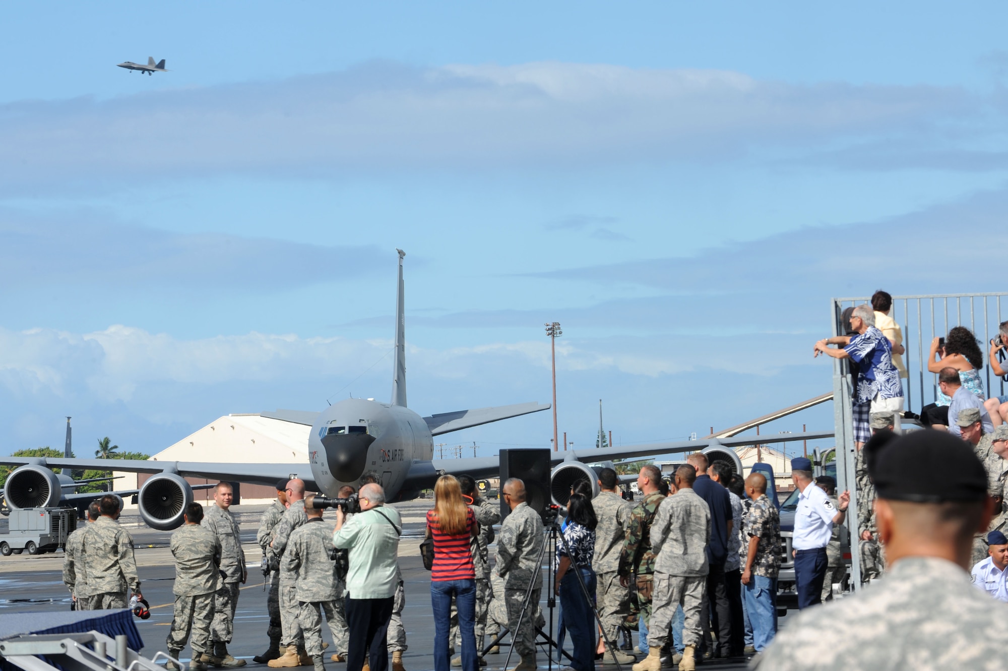 An F-22 Raptor soars through the sky during the F-22 Arrival Ceremony here, July 9. The F-22 Raptor is the Air Force's newest fighter aircraft. Its combination of stealth, supercruise, maneuverability, and integrated avionics, coupled with improved supportability, represents an exponential leap in warfighting capabilities. The ceremony marks the beginning of the partnership between the Hawaii Air National Guard and the active duty Air Force flying the “fifth generation” fighter at Hickam. The F-22 Raptors are assigned to the 199th Fighter Squadron,154th Wing, Hawaii Air National Guard and the 19th Fighter Squadron, 15th Wing. (U.S. Air Force photo/Senior Airman Gustavo Gonzalez)