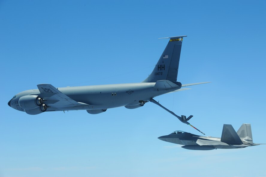 JOINT BASE PEARL HARBOR HICKAM, Hawaii ? A Hickam F-22 Raptor prepares to refuel over the Pacific Ocean on its way to Joint Base Pearl Harbor Hickam from a Hickam KC-135 Stratotanker assigned to the 199th Air Refueling Squadron, July 2. The 199th Fighter Squadron of the Hawaii Air National Guard is transitioning from the F-16 and will serve as the only Air National Guard led joint Guard and Active Duty squadron in the Pacific and the second in the U.S. Air Force. (U.S. Air Force photo/Senior Airman Gustavo Gonzalez)