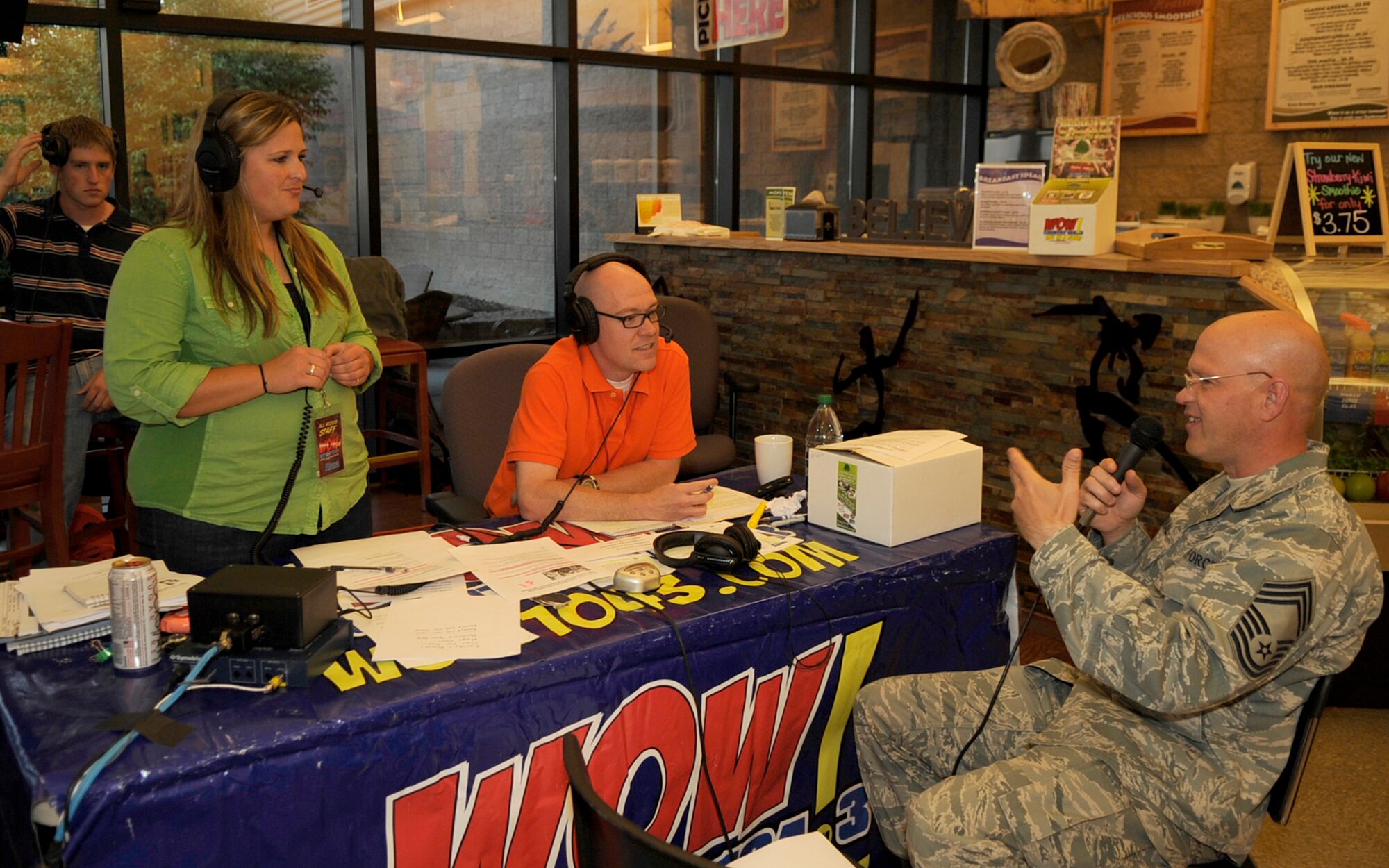 Chief Master Sgt. Richard Gornal, 366th Fighter Wing plans programs and assessments office, speaks with Randy and Alana of the WOW 104.3 Randy & Alana Show during a live radio broadcast from the fitness center here 1 July.  The talk show hosts interviewed a mixture of officers, enlisted Airmen and civilians of the base during their broadcast.  Topics focused on why our Airmen joined the Air Force, what they did in their current jobs, their deployment experiences and how life in the Air Force affects families both at home and deployed.  (U.S. Air Force photo by Airman 1st Class Angelina Drake)
