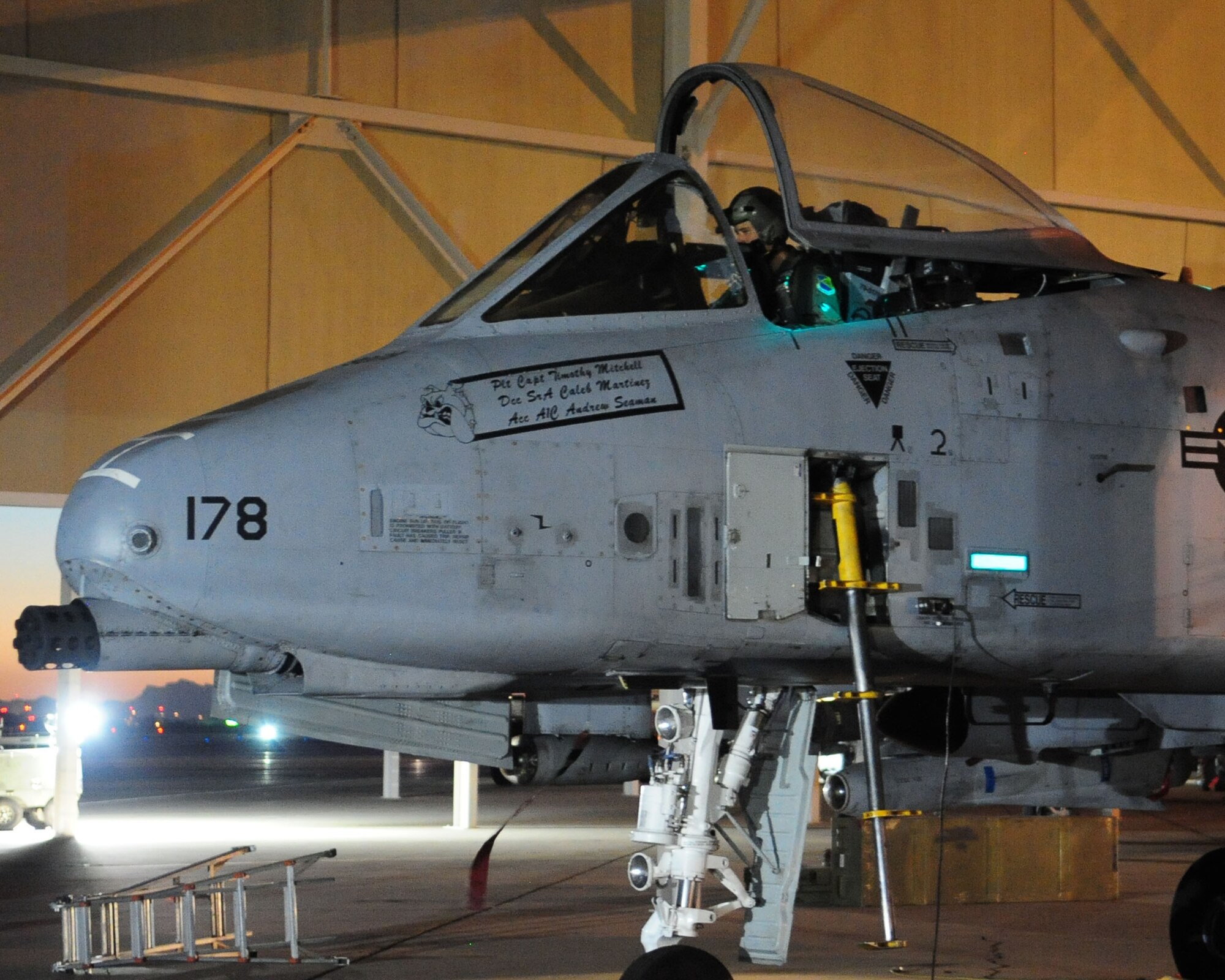 The canopy of an A-10C Thunderbolt II lowers as 1st Lt. Dan Griffin prepares to depart the flight line for his second of eight night flying missions here June 23. Lieutenant Griffin is a student in the A-10C Pilot Initial Qualification course and as part of his training requirements he must learn to execute night flying missions using night vision goggles. He accomplished this training through six hours of academic classes, five hours in the A-10 FMT, also known as a simulator, and eight flights. (U.S. Air Force photo/Airman 1st Class Jerilyn Quintanilla)