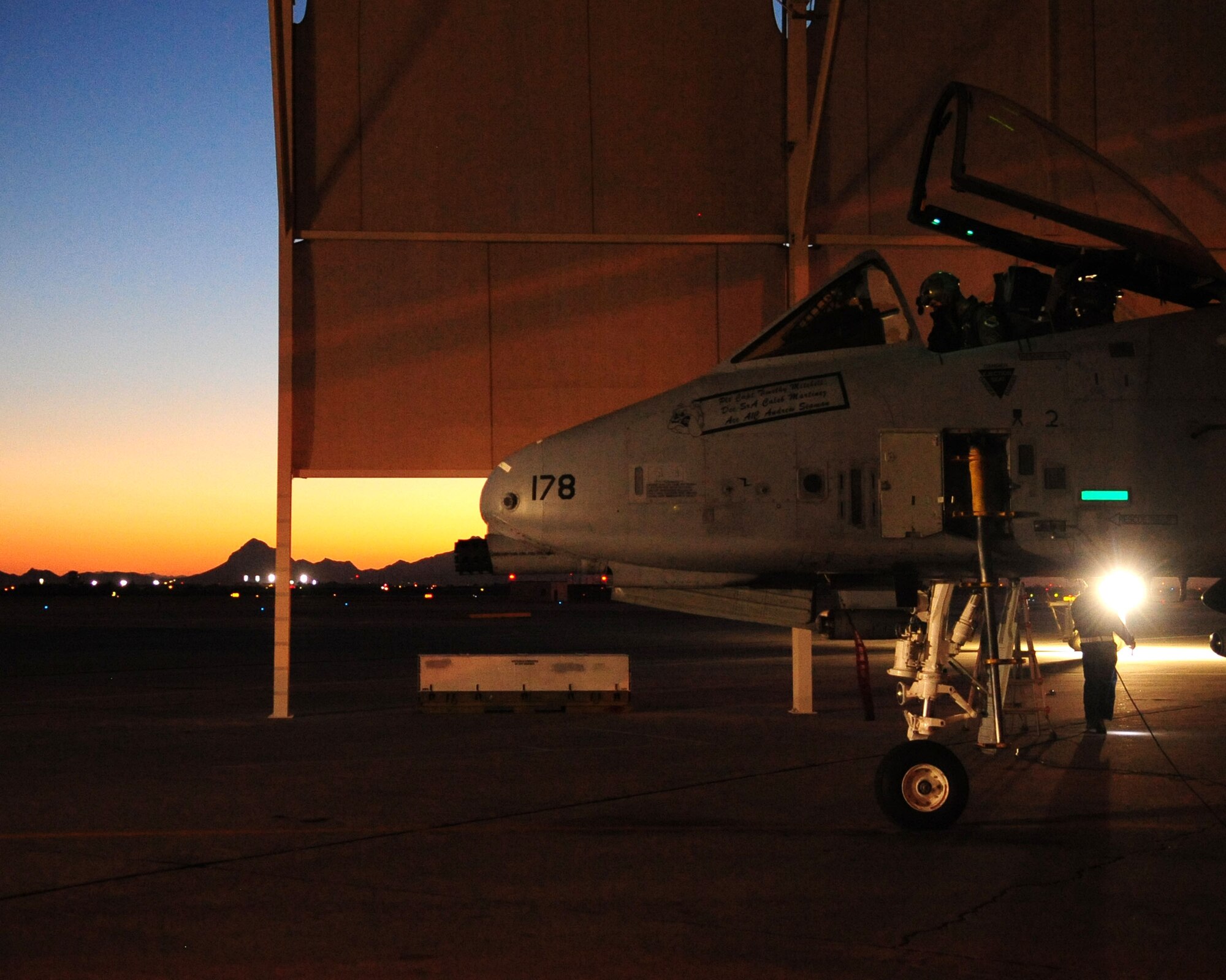 1st Lt. Dan Griffin, a pilot from the 358th Fighter Squadron, performs his final operations checks on his A-10C aircraft prior to departing for a night flying mission June 23. Lieutenant Griffin is a student in the A-10C Pilot Initial Qualification course and upon completion of this course he will be a fully qualified A-10C pilot. (U.S. Air Force photo/Airman 1st Class Jerilyn Quintanilla)