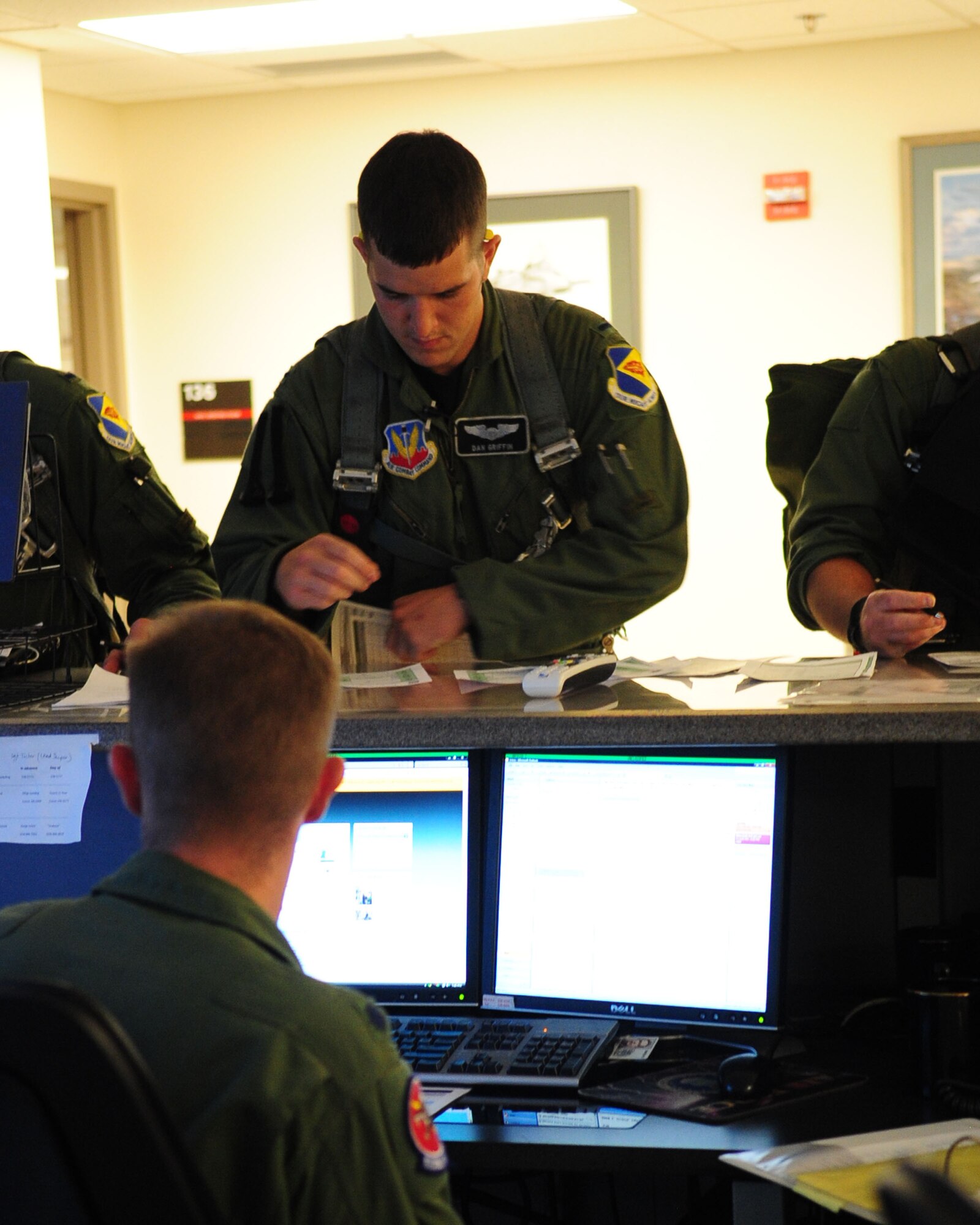 1st Lt. Dan Griffin, a pilot from the 358th Fighter Squadron, looks over his pre-flight checklists just before stepping out to the flight line here June 23. This was the second of eight night flights for the lieutenant. As part of the A-10C Pilot Initial Qualification course curriculum, he must learn to execute night flying missions using night vision goggles. He’ll accomplish this over the next few weeks through six hours of academic classes, five hours in the A-10 FMT, also known as a simulator, and eight flights. (U.S. Air Force photo/Airman 1st Class Jerilyn Quintanilla)