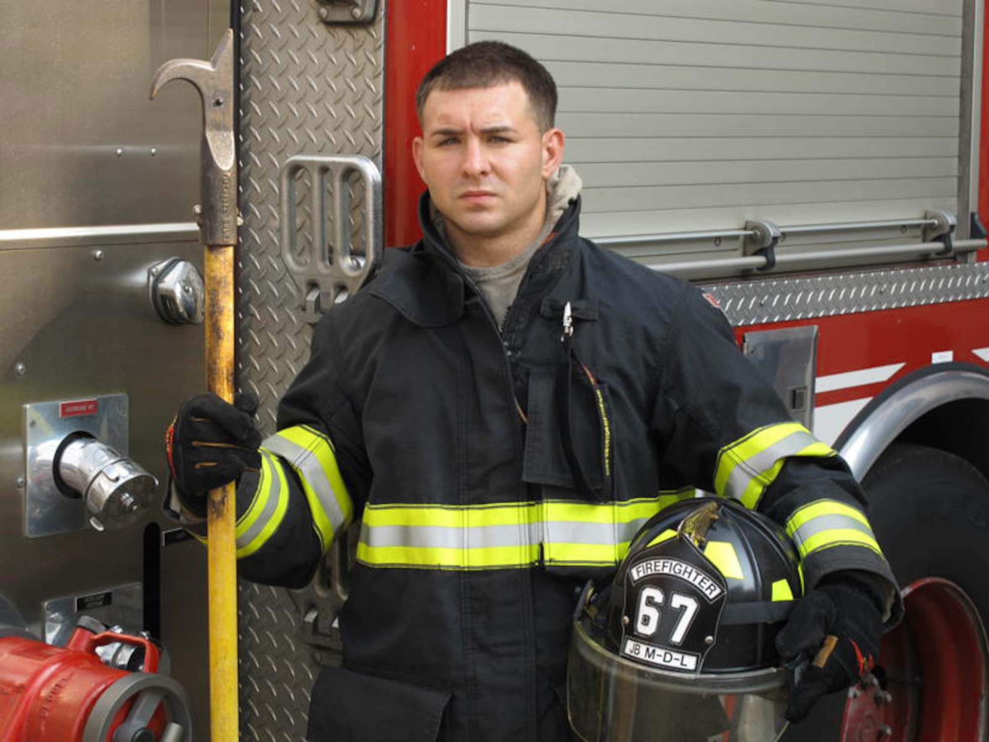 Senior Airman John Muirhead rescued an infant during a dwelling fire July 2, 2010, in Jamesburg, N.J. Airman Muirhead is a driver operator/fire fighter with the 87th Civil Engineer Squadron fire department. (Courtesy photo)