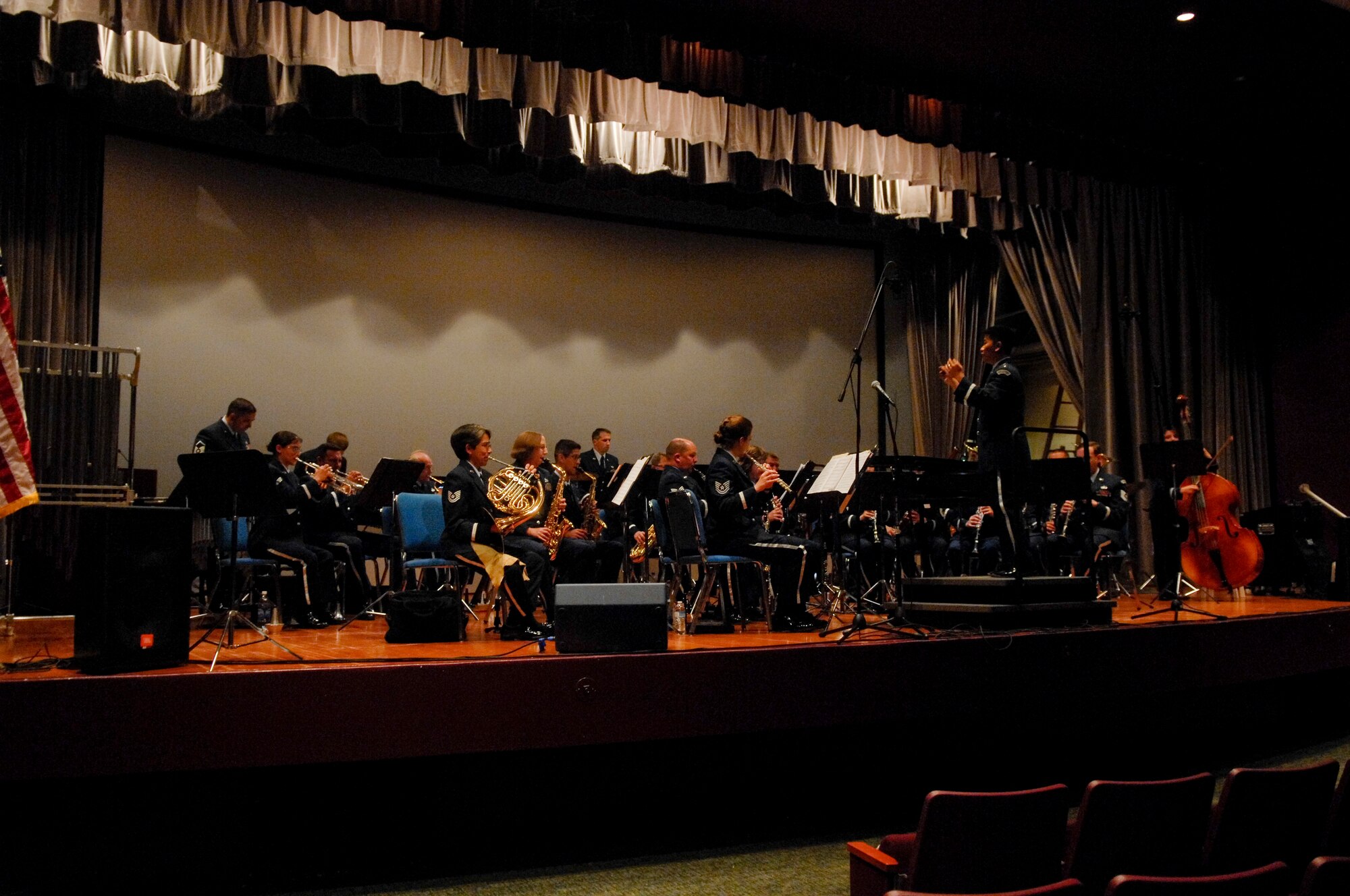 VANDENBERG AIR FORCE BASE, Calif. -- The Air National Guard Band of the West Coast plays for the Vandenberg community here Thursday, July 8, 2010. Approximately 30 National Guardsmen, primarily from the San Francisco Bay area and a handful from as far as Idaho, Washington, Oregon and Nevada, assemble more than 100 times a year to provide musical products and services to the ANG, the United States Air Force and the community. (U.S. Air Force photo/Staff Sgt. Levi Riendeau)