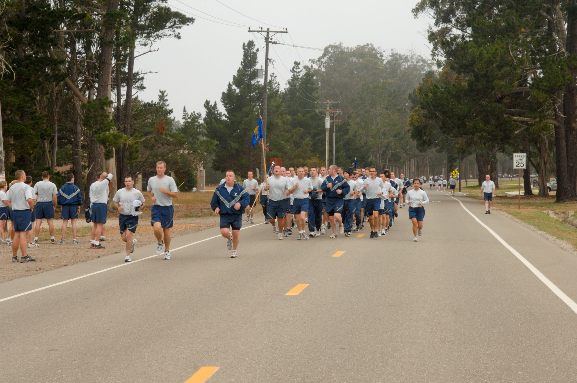 VANDENBERG AIR FORCE BASE, Calif. -- Members of Team Vandenberg finish up the Fit-to-Fight run here Wednesday, June 30, 2010.  The run is Vandenberg’s way of holding its Airmen to a high standard of physical fitness each month. (U.S. Air Force photo/Staff Sgt. Levi Riendeau)