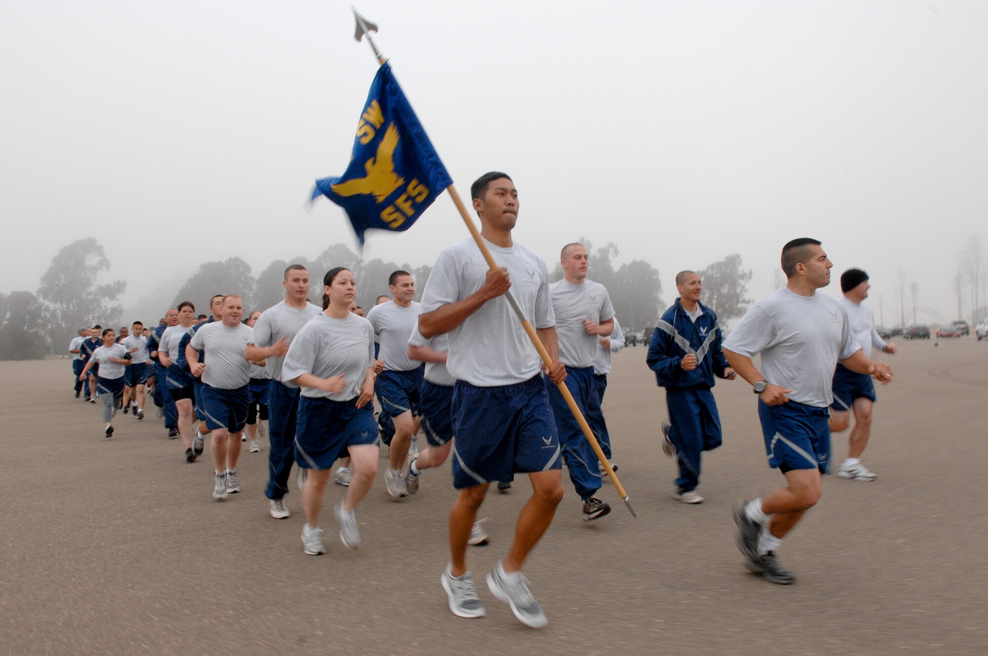VANDENBERG AIR FORCE BASE, Calif. -- Members of the 30th Security Forces Squadron run in formation at the Fit-to-Fight run here Wednesday, June 30, 2010.  The run is Vandenberg’s way of holding its Airmen to a high standard of physical fitness each month. (U.S. Air Force photo/Staff Sgt. Levi Riendeau)