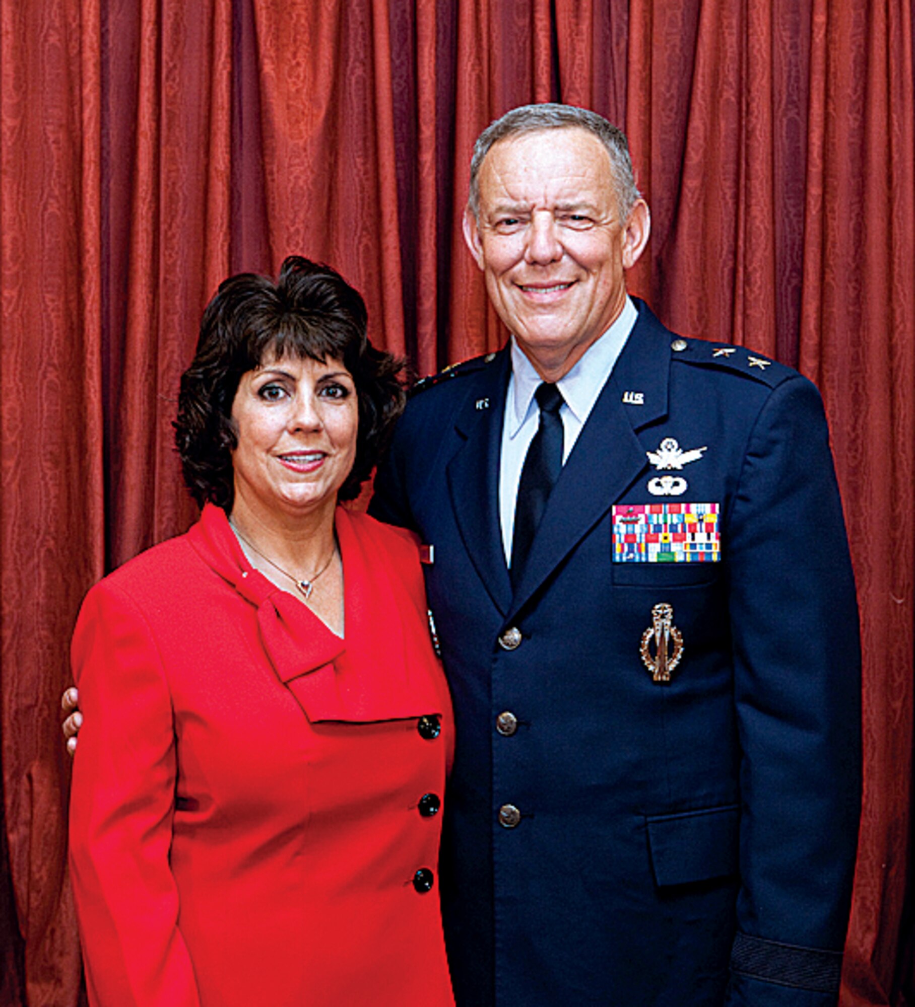 Maj. Gen. C. Donald Alston and his wife, Ana, pose for a photo during the reception after the change-of-command ceremony. (U.S. Air Force photo by Jeff Allred)