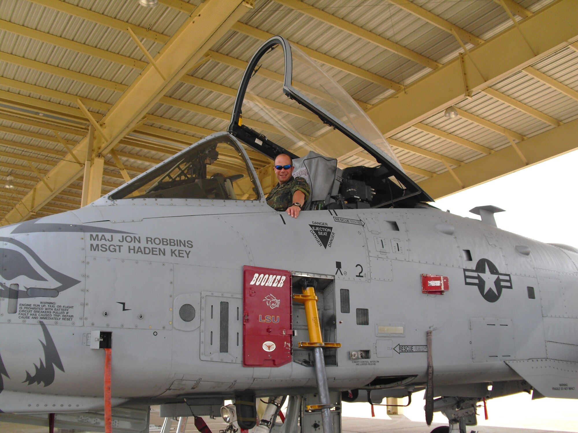 Maj. Jens Cichorek, an Airman in the German Air Force Reserve, sits in the cockpit of and A-10C Thunderbolt II "Warthog" during a tour of the 188th Fighter Wing's flightline June 17. Cichorek visited the 188th, an Arkansas Air National Guard  unit, as part of the Reserve Officer Foreign Exchange Program. (U.S. Air Force photo by Capt. Matt Holguin/188th Fighter Wing)