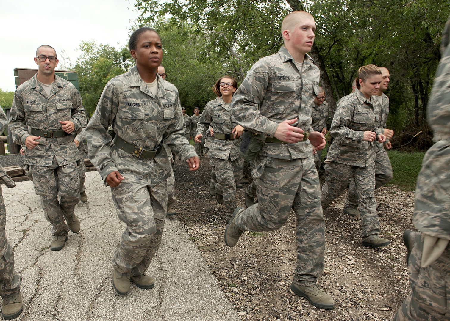 Air Force Basic Military Training trainees from the 320th Training Squadron move to the next obstacle while running the obstacle course June 30. The 737th Training Group trains approximately 35,000 Airmen each year. More than seven million Airmen have completed BMT since 1946. (U.S. Air Force photo/Robbin Cresswell) 