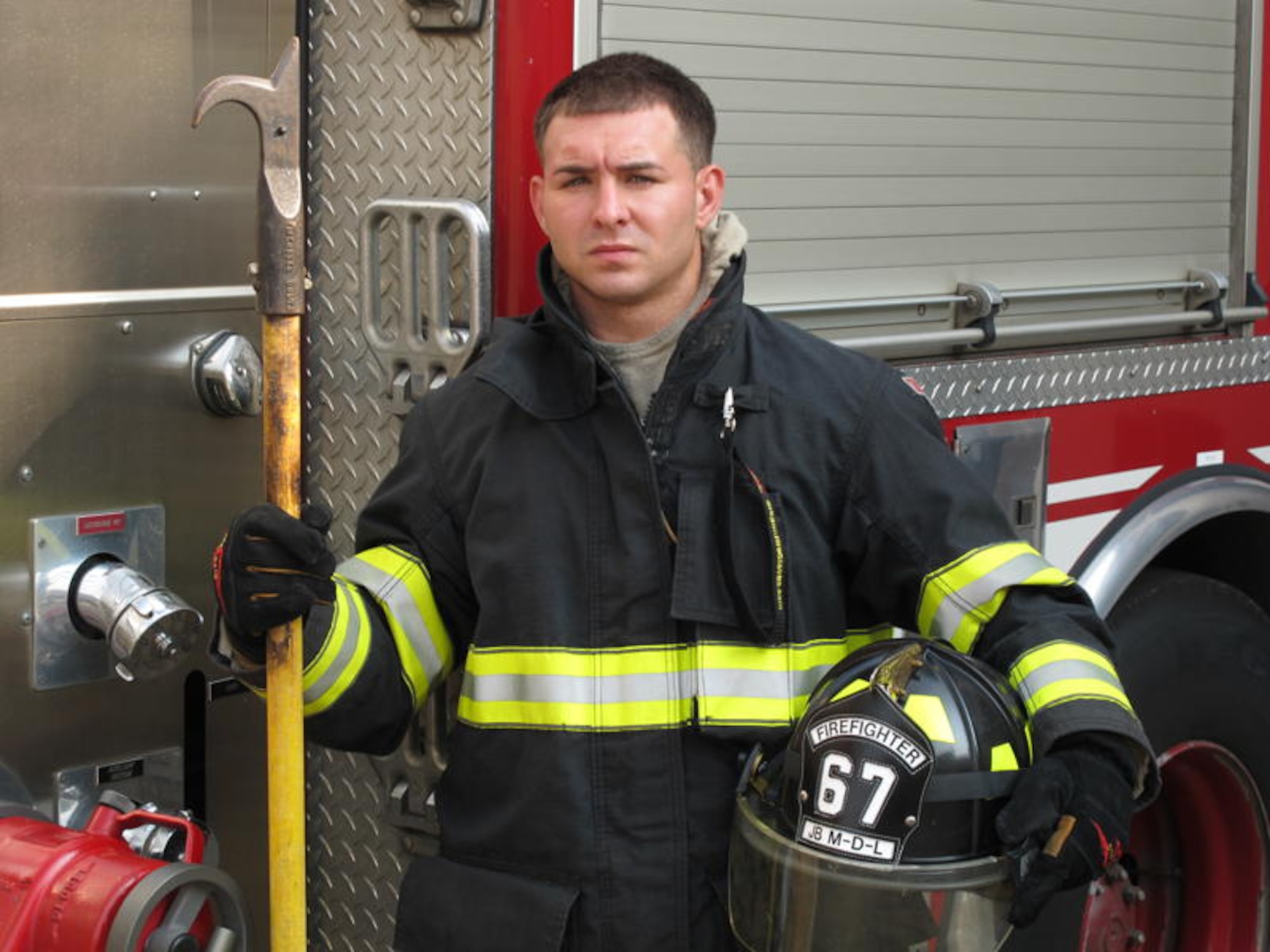 Senior Airman John Muirhead, driver operator/fire fighter, 87th Civil Engineer Squadron, Civil Engineer Fire Department, assigned to McGuire Fire Department since 2006, risked his life in the rescuing of an infant during a dwelling fire in Jamesburg July 2. (Courtesy photo)