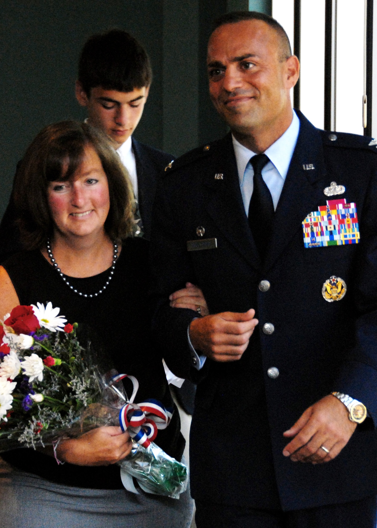 Newly appointed 96th Air Base Wing Commander, Col. Sal Nodjomian and wife Carla walk out together after the change of command ceremony July 8 at the officers club.  Colonel Nodjomian and his family arrive to Eglin Air Force Base, Fla., from Washington, D.C., where he was the Senior Military Assistant, Assistant Secretary of the Air Force, Installations, Environment and Logistics.  (U.S. Air Force photo/Samuel King Jr.)